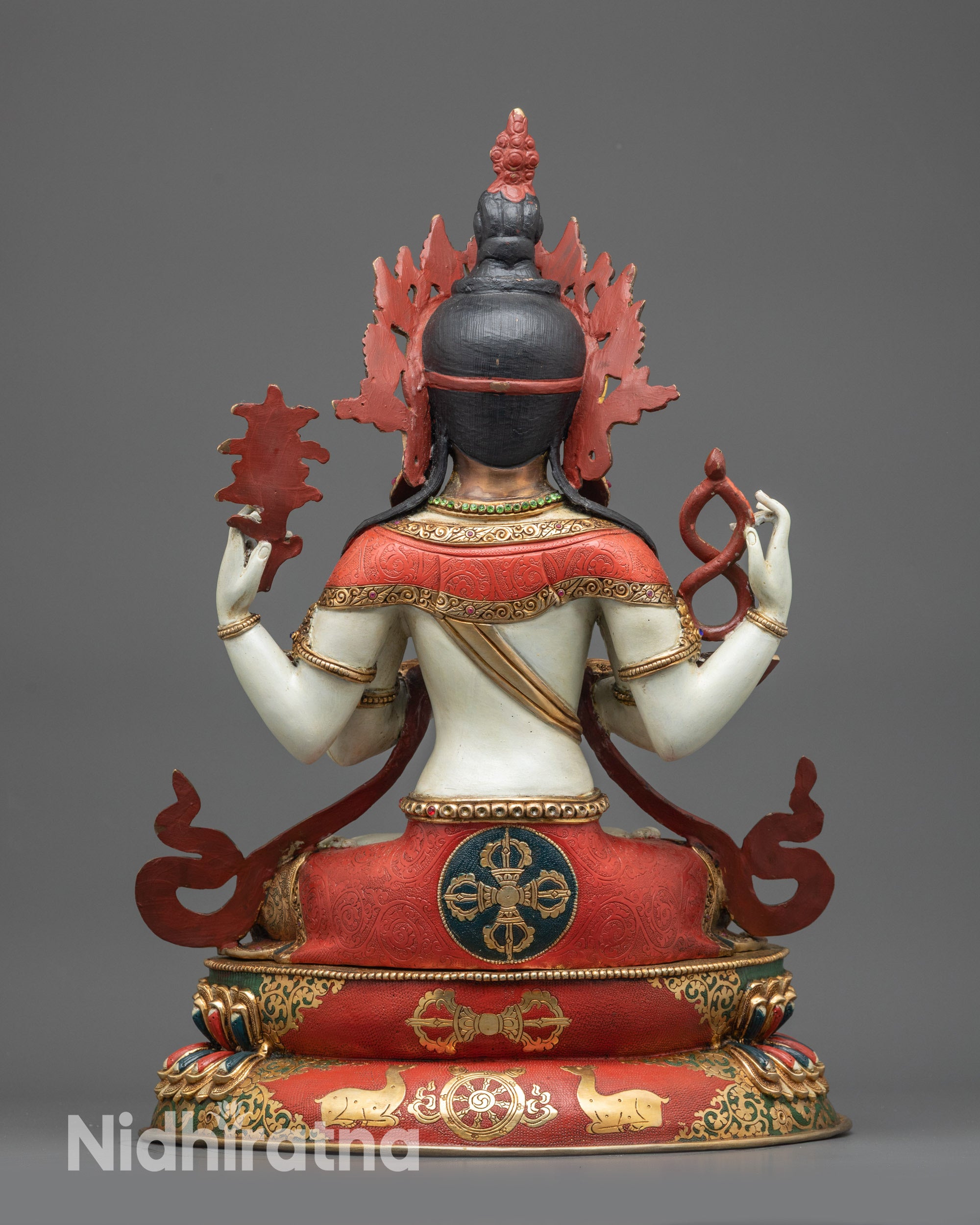 Back view Chenrezig statue featuring intricate carvings and hand-painted robe details