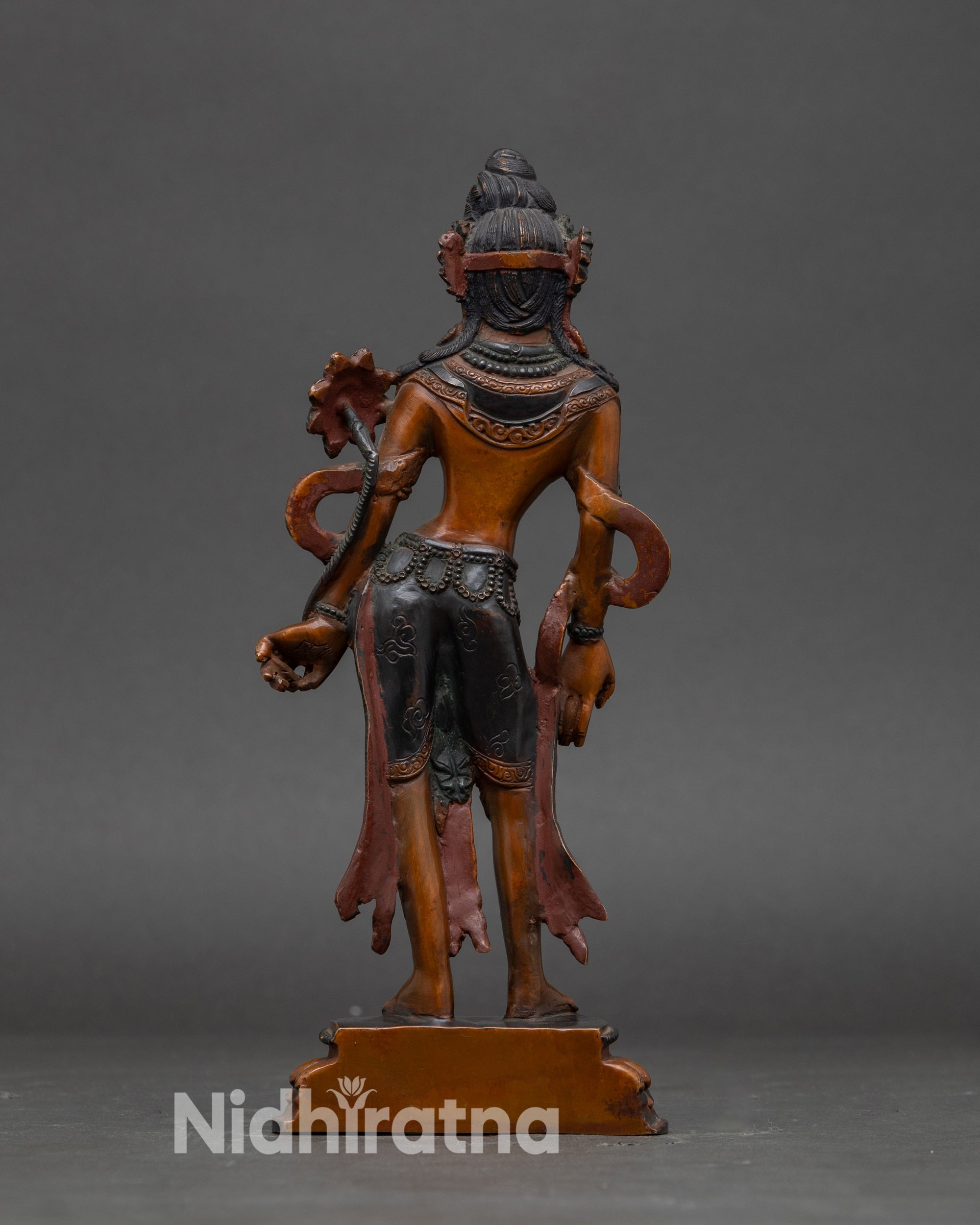 Back view Chenrezig statue highlighting Newari craftsmanship and carved motif details on robes