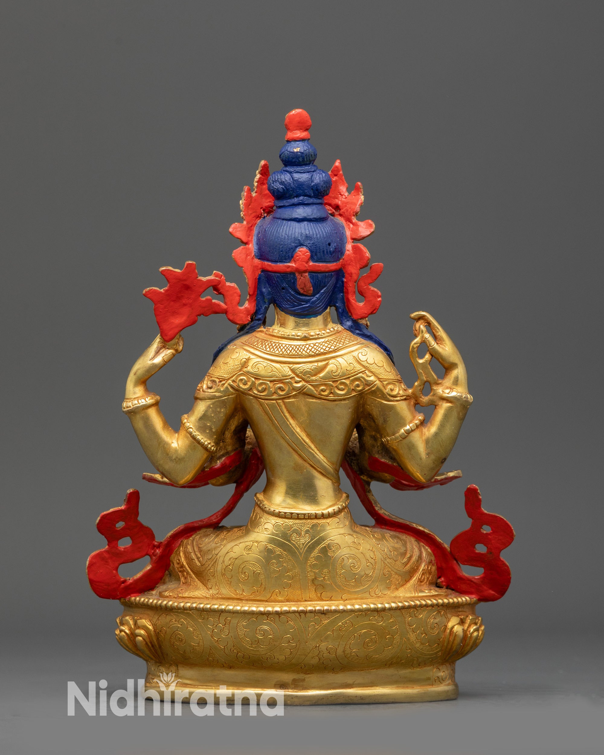 Back view Chenrezig statue showing detailed necklaces and fire-gilded copper finish
