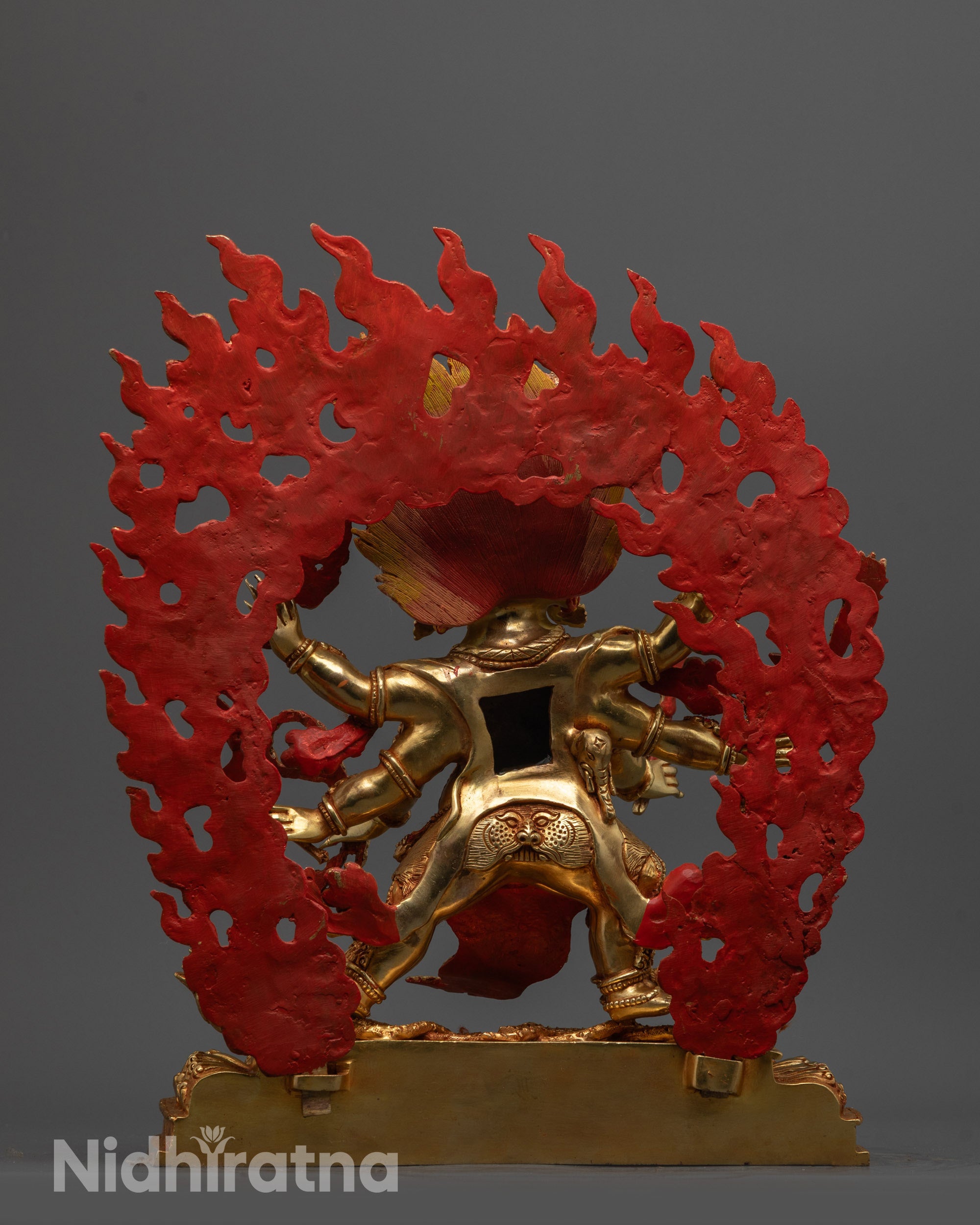 Back view Dharmapala Statue highlighting solid copper base and artisan hand-carved design
