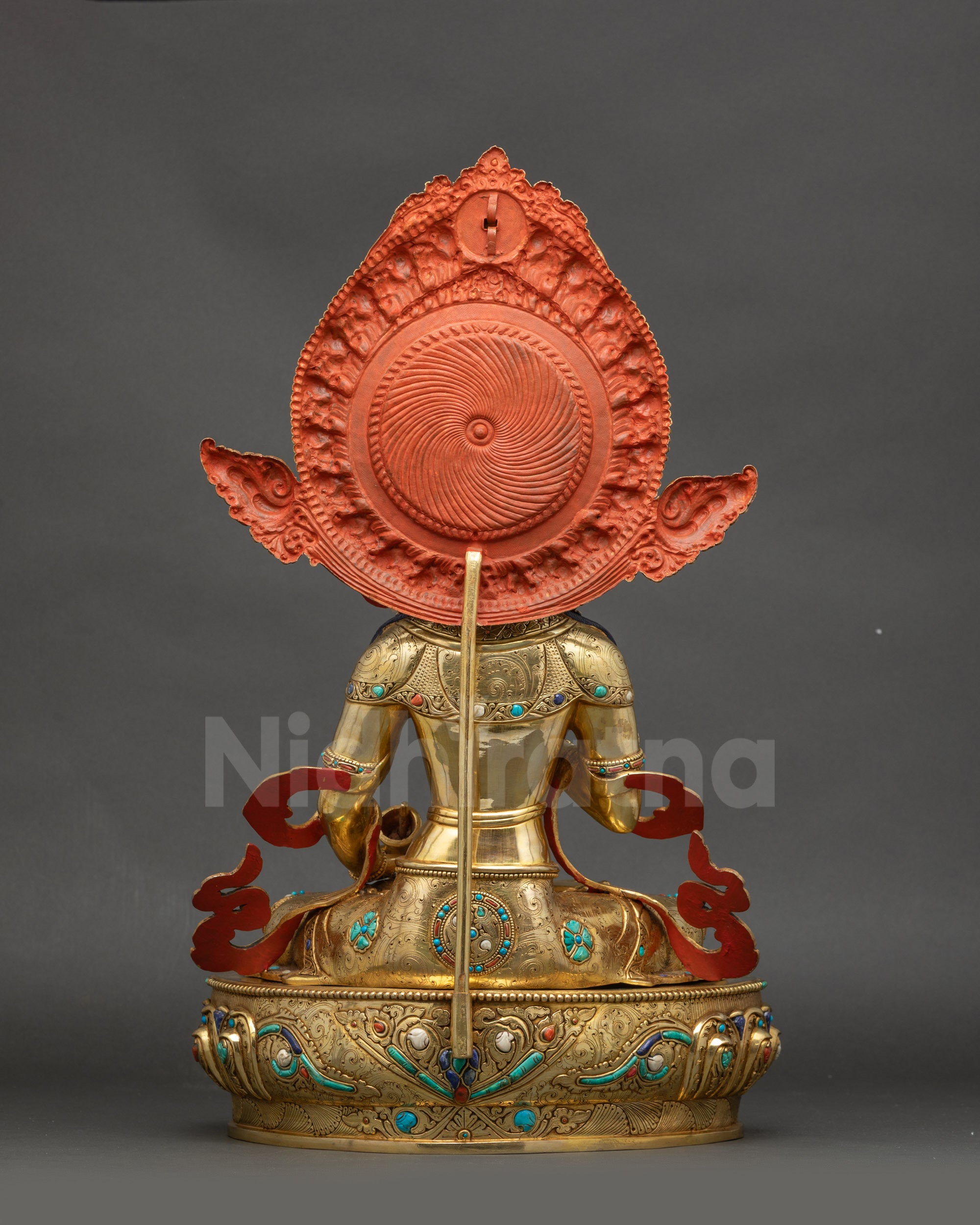 Back view Dorje Sempa sculpture intricately carved lotus patterns and radiant halo motifs