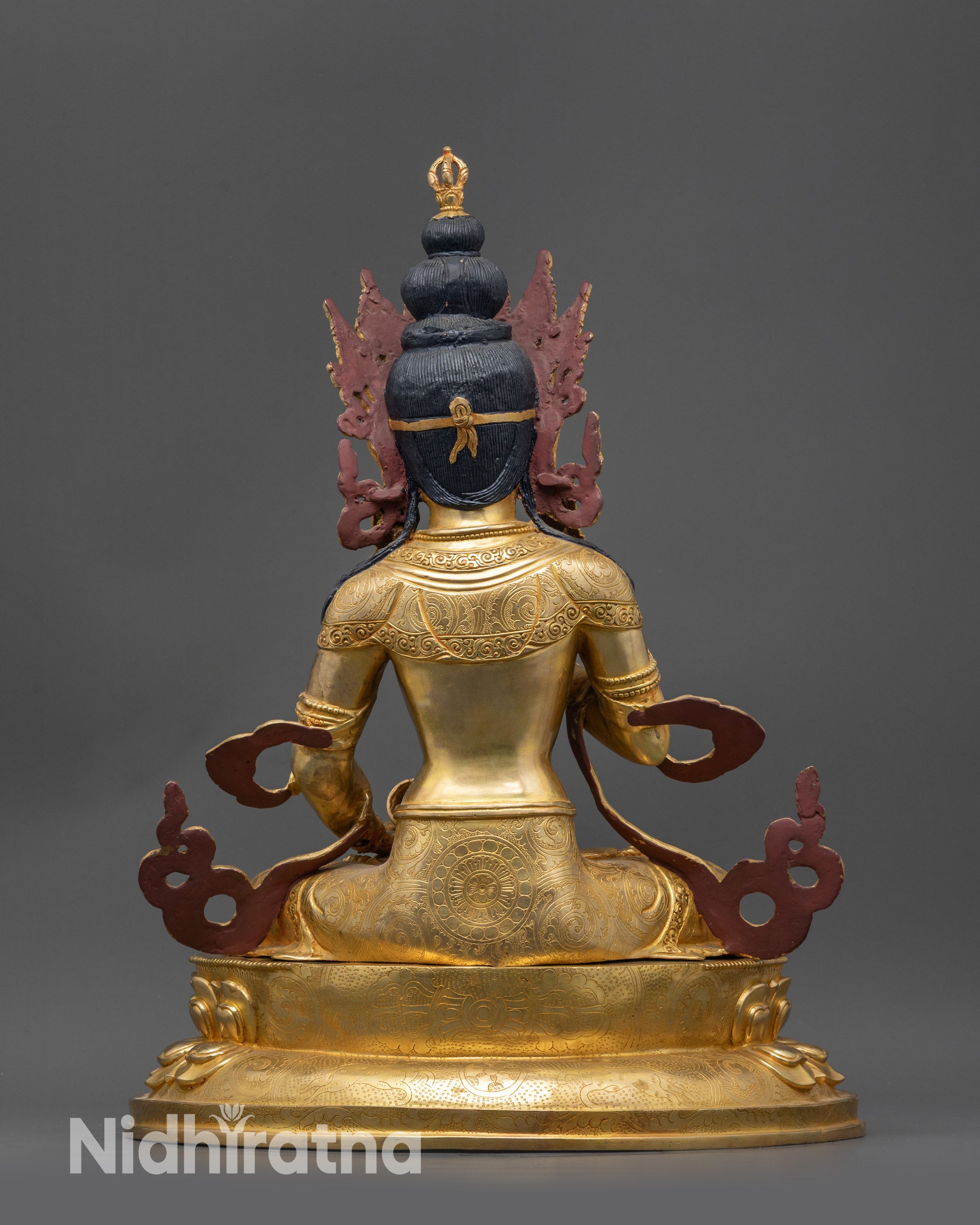 Back view Dorje Sempa statue with carved dharma wheel and deer on double-layered lotus seat