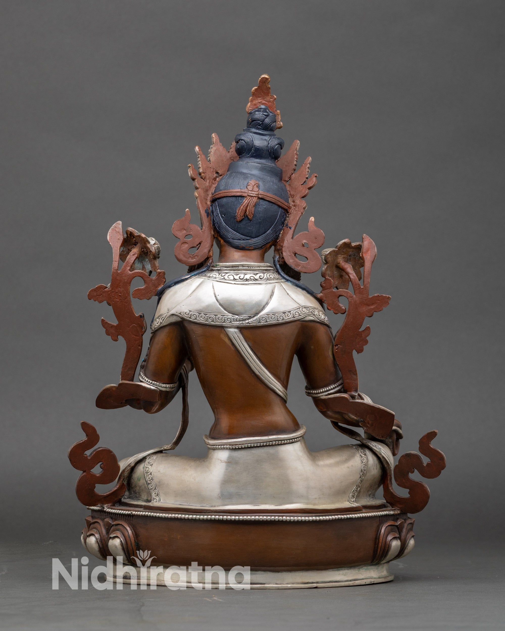 Back view Green Tara statue, handmade Nepalese Buddhist sculpture with flowing robes