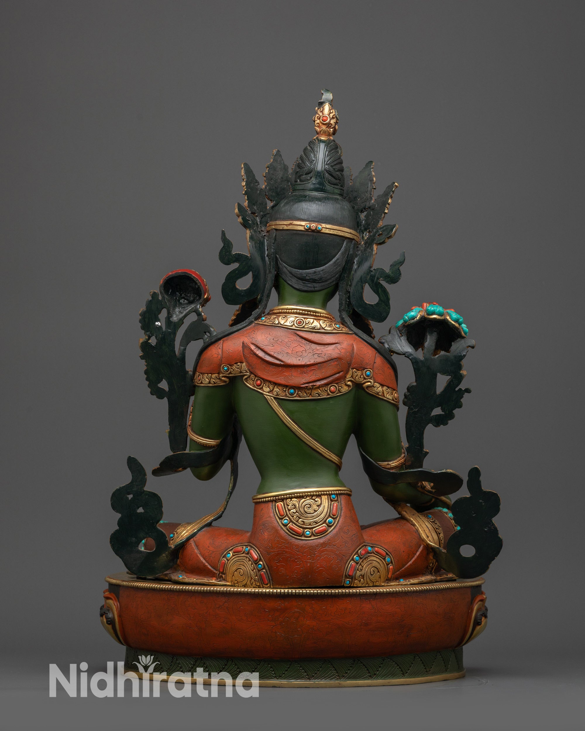 Back view Green Tara statue showing gold-plated robe and detailed carvings