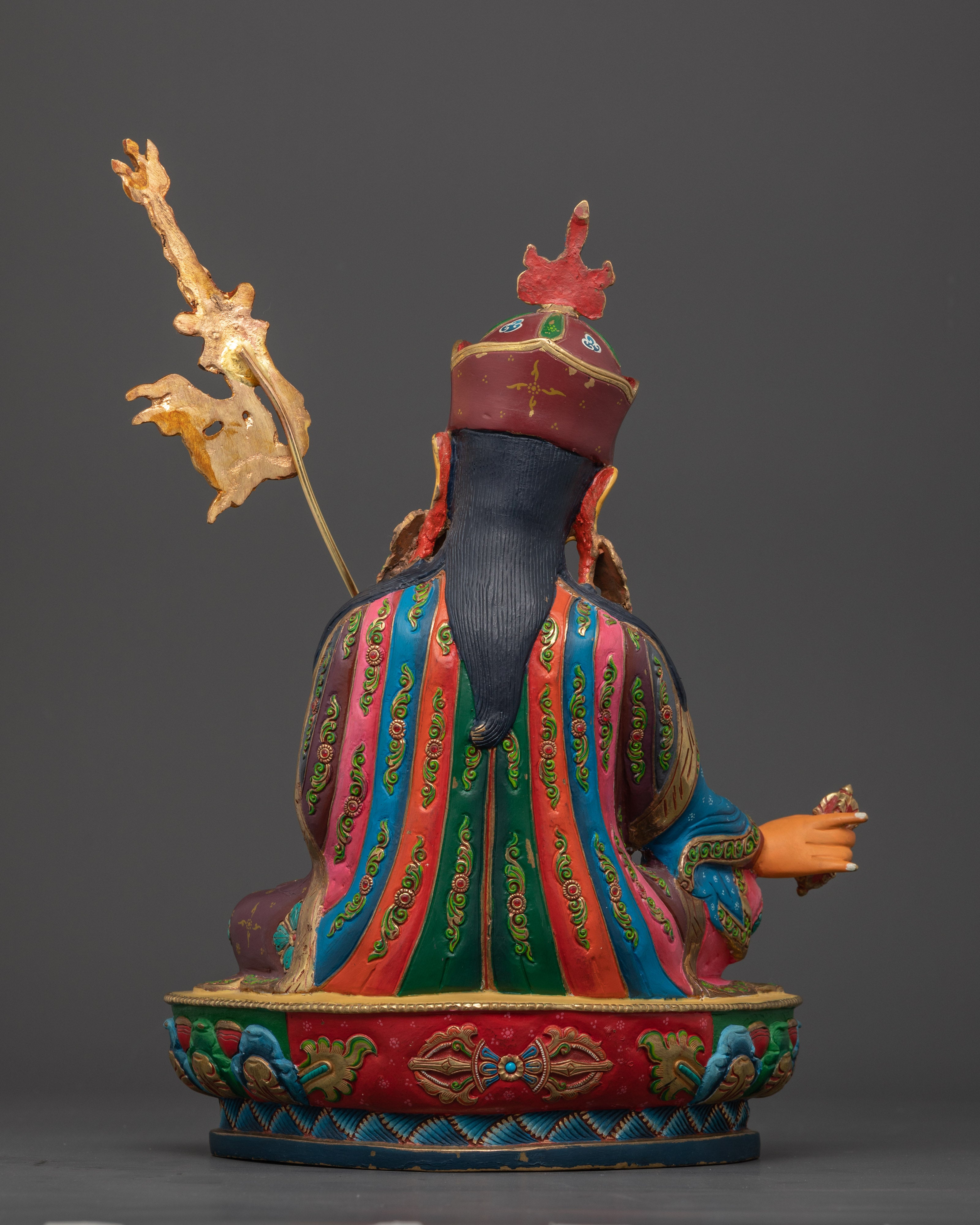Back view Guru Rinpoche copper statue, with gold accents, intricate lotus carving, and Nepalese art