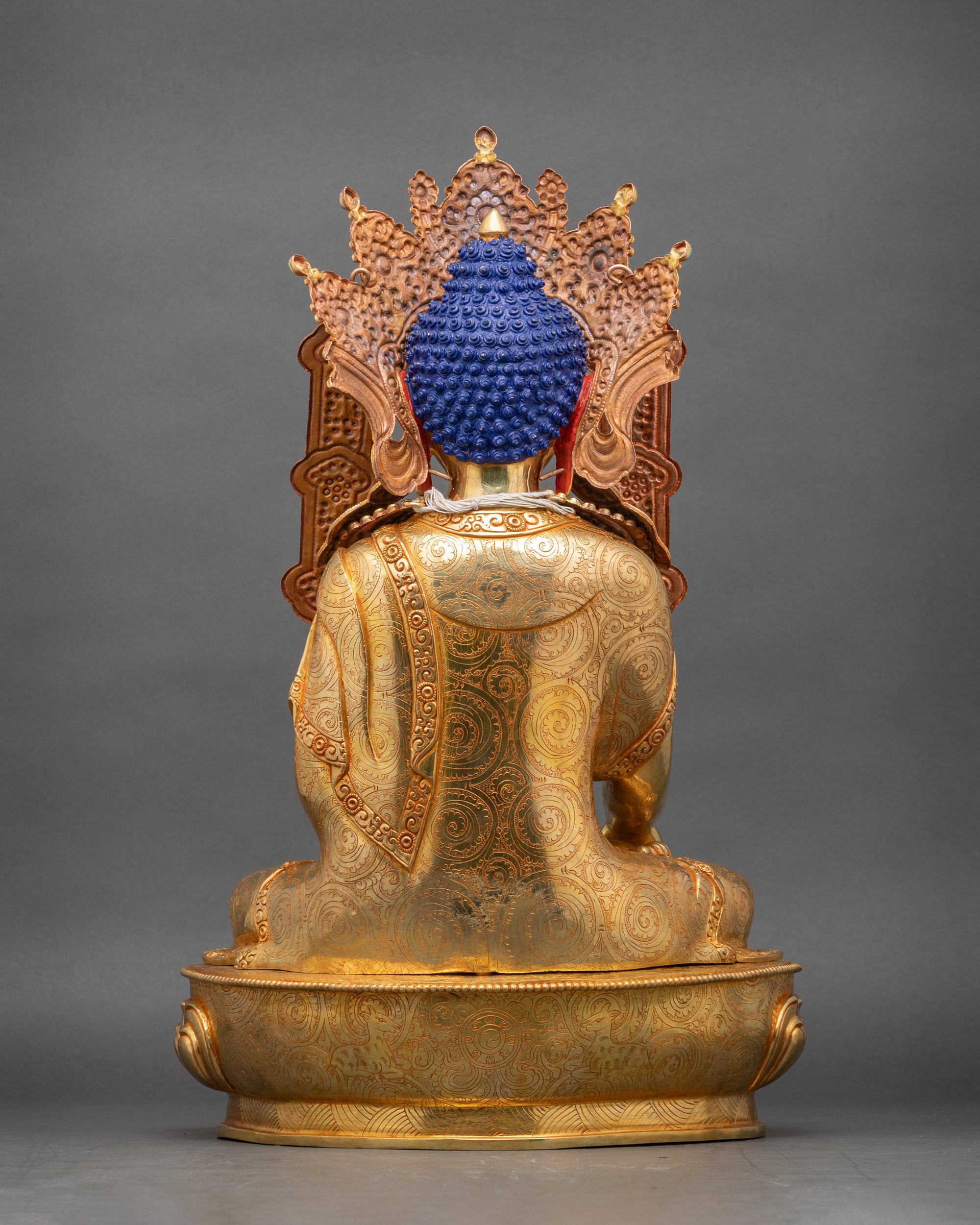Back view Himalayan Jowo Rinpoche statue with intricately carved ceremonial robe and jewelry