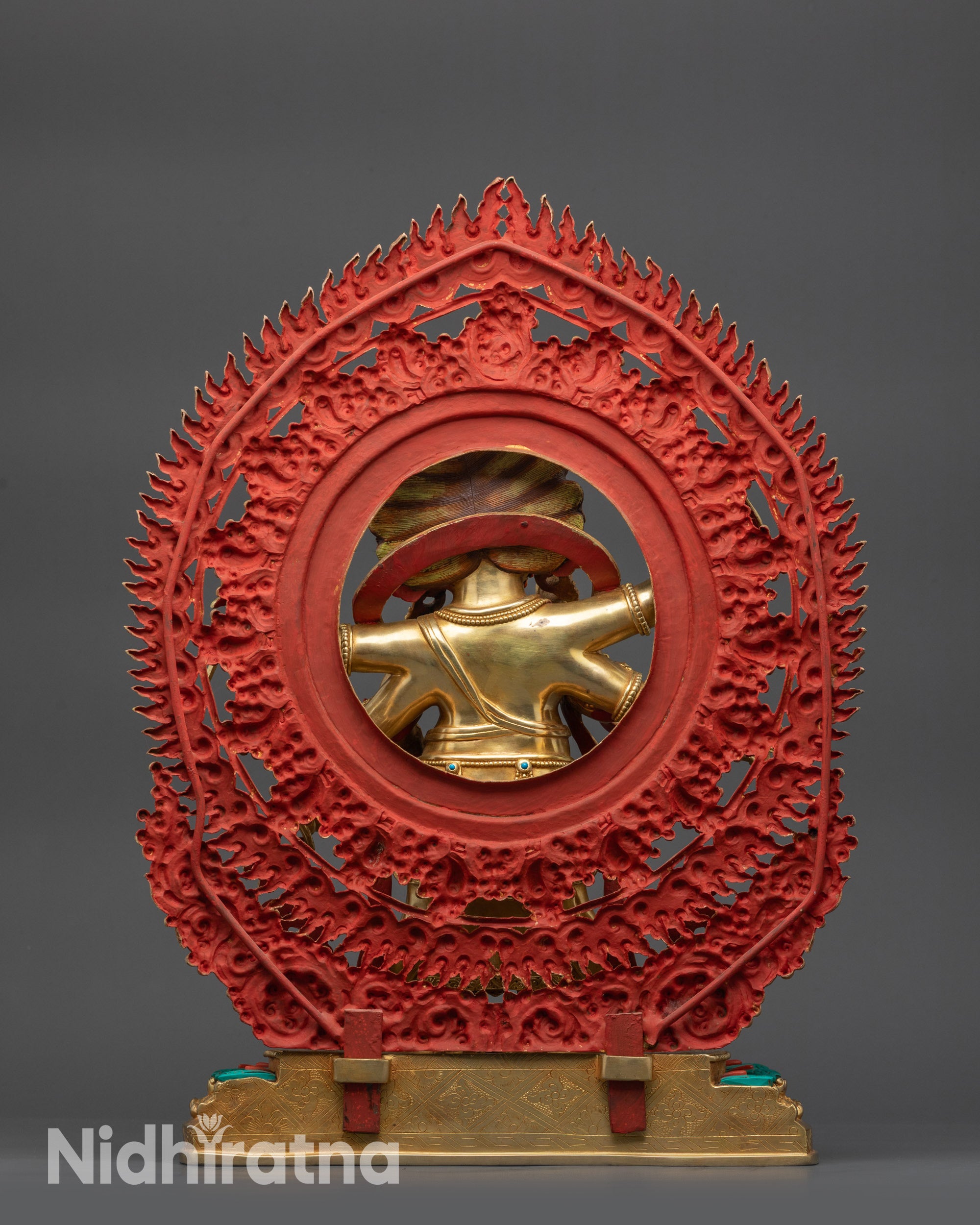 Back view Himalayan Mahakala statue with giant halo and floral patterned motifs