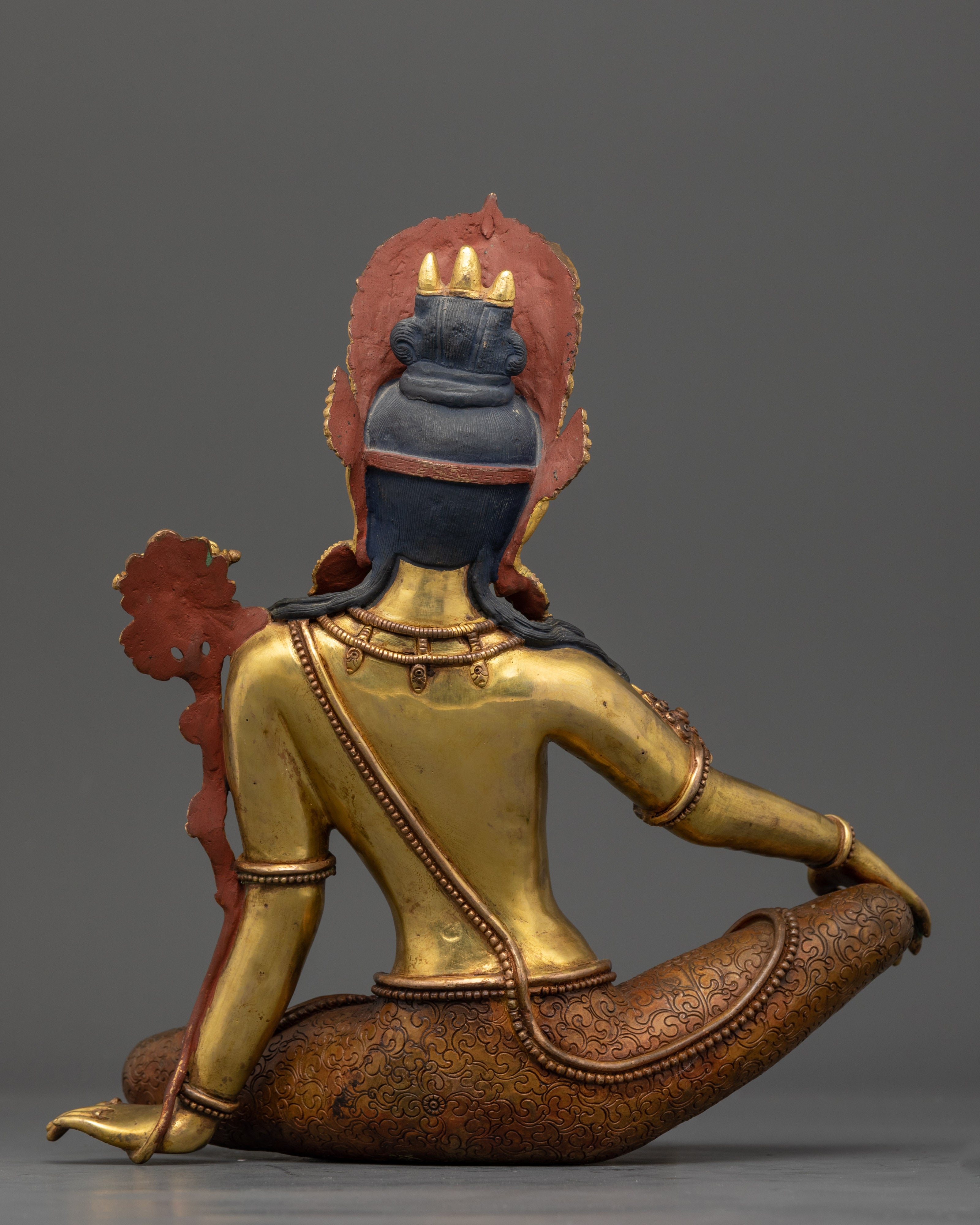 Back view Indra gold-gilded sculpture intricate crown and jewelry Himalayan art