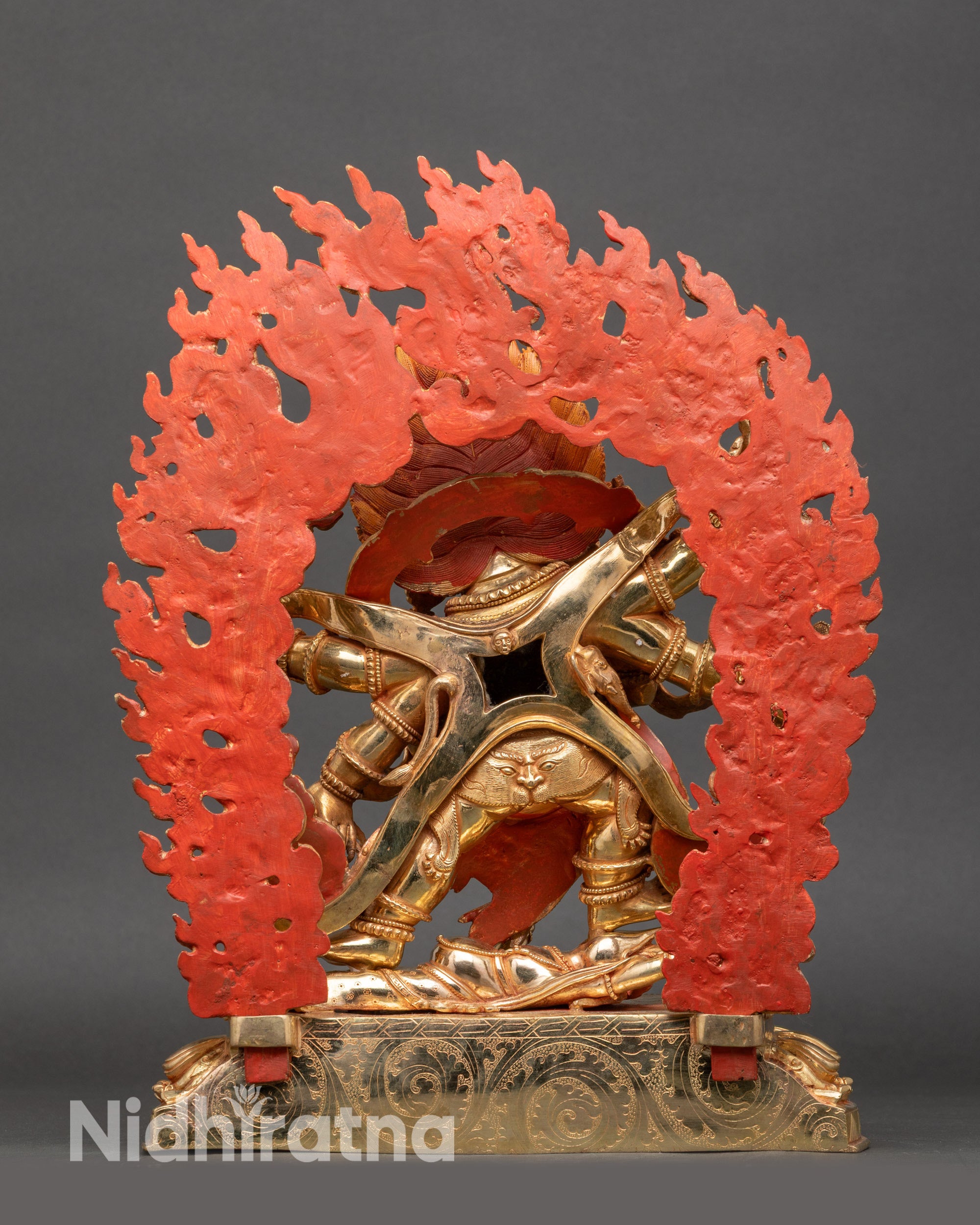 Back view Mahakala statue on lotus pedestal, handmade Nepalese Buddhist protector sculpture