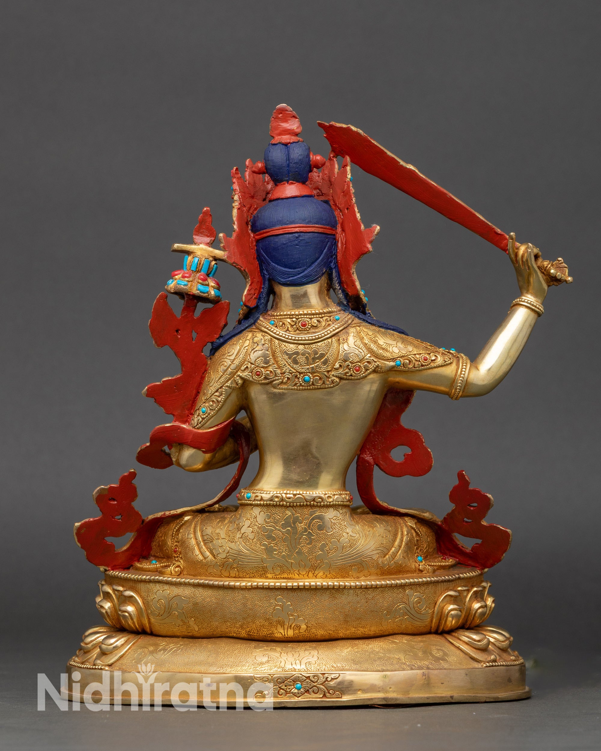 Back view Manjushree statue, handmade Nepalese Buddhist sculpture with engraved double lotus