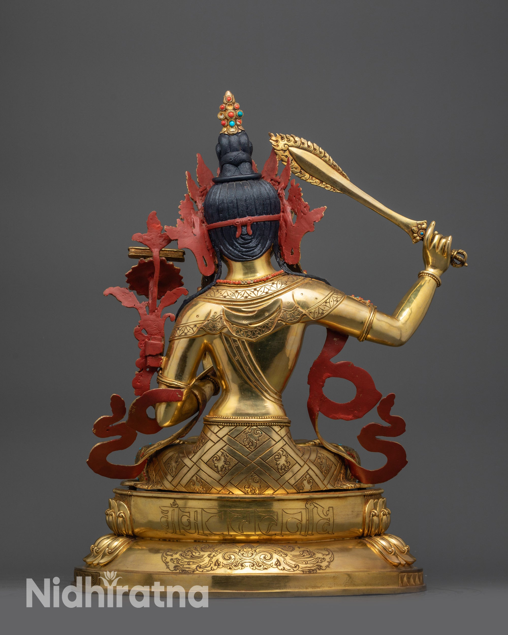 Back view Manjushri Sculpture displaying double-layered lotus throne and detailed carvings