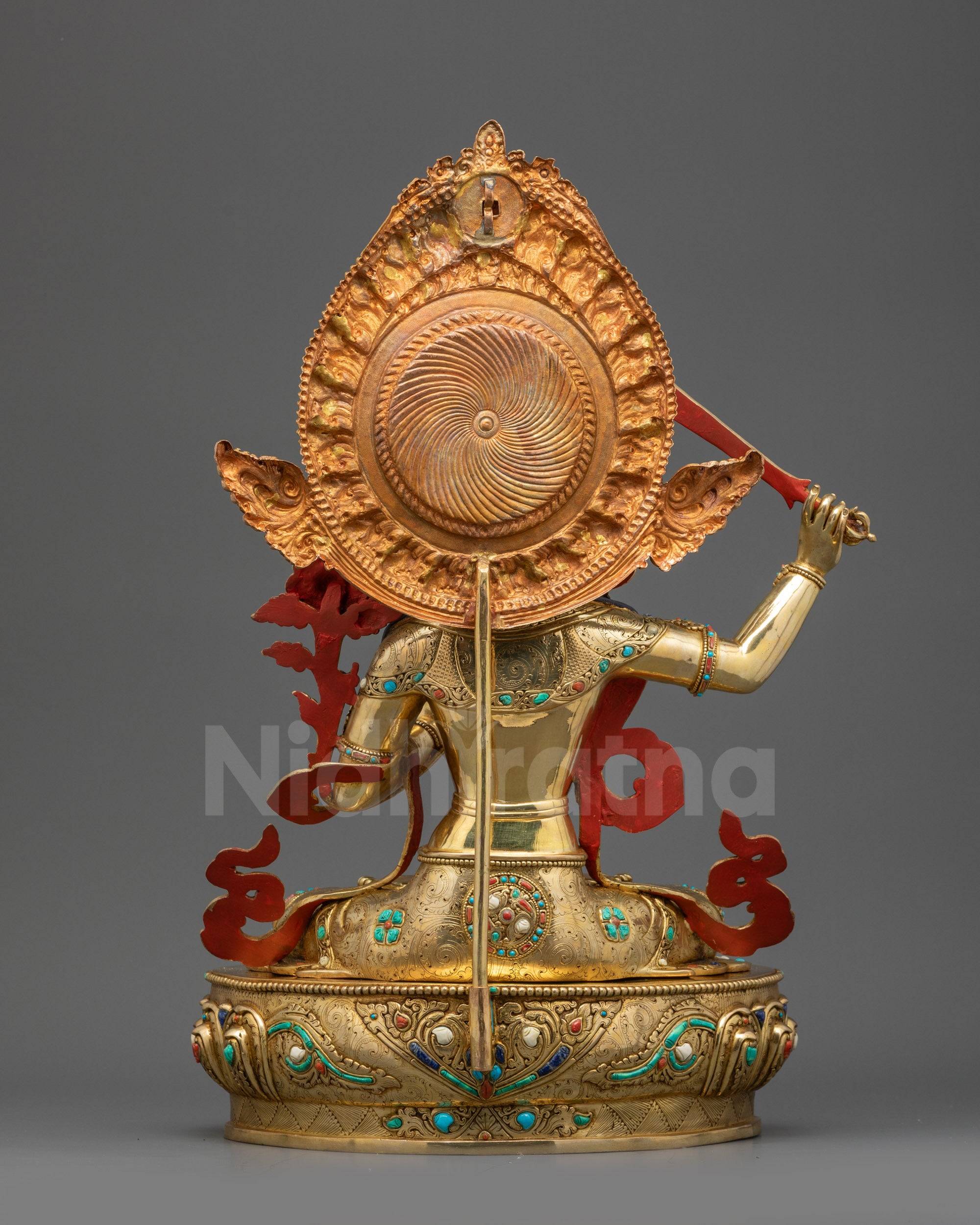 Back view Manjushri Statue revealing detailed robe patterns and halo craftsmanship