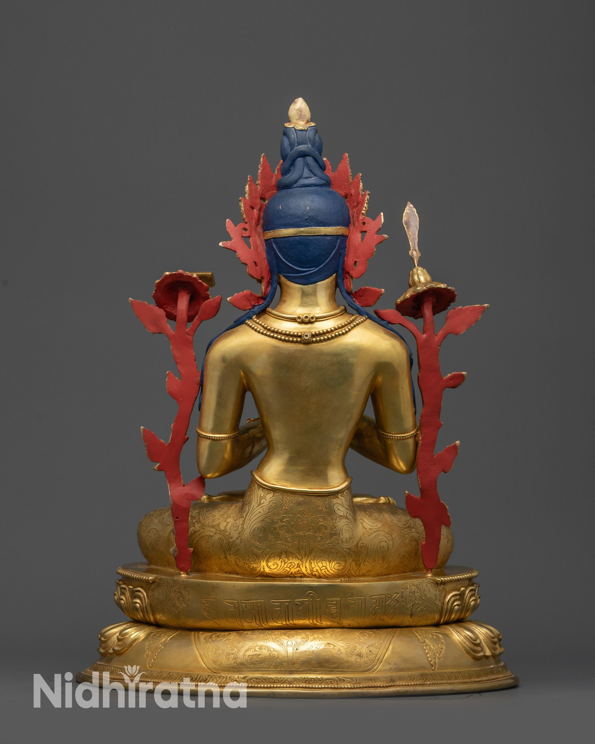 Back view Manjushri Statue with lotus seat carvings of Manjushri mantra for meditation