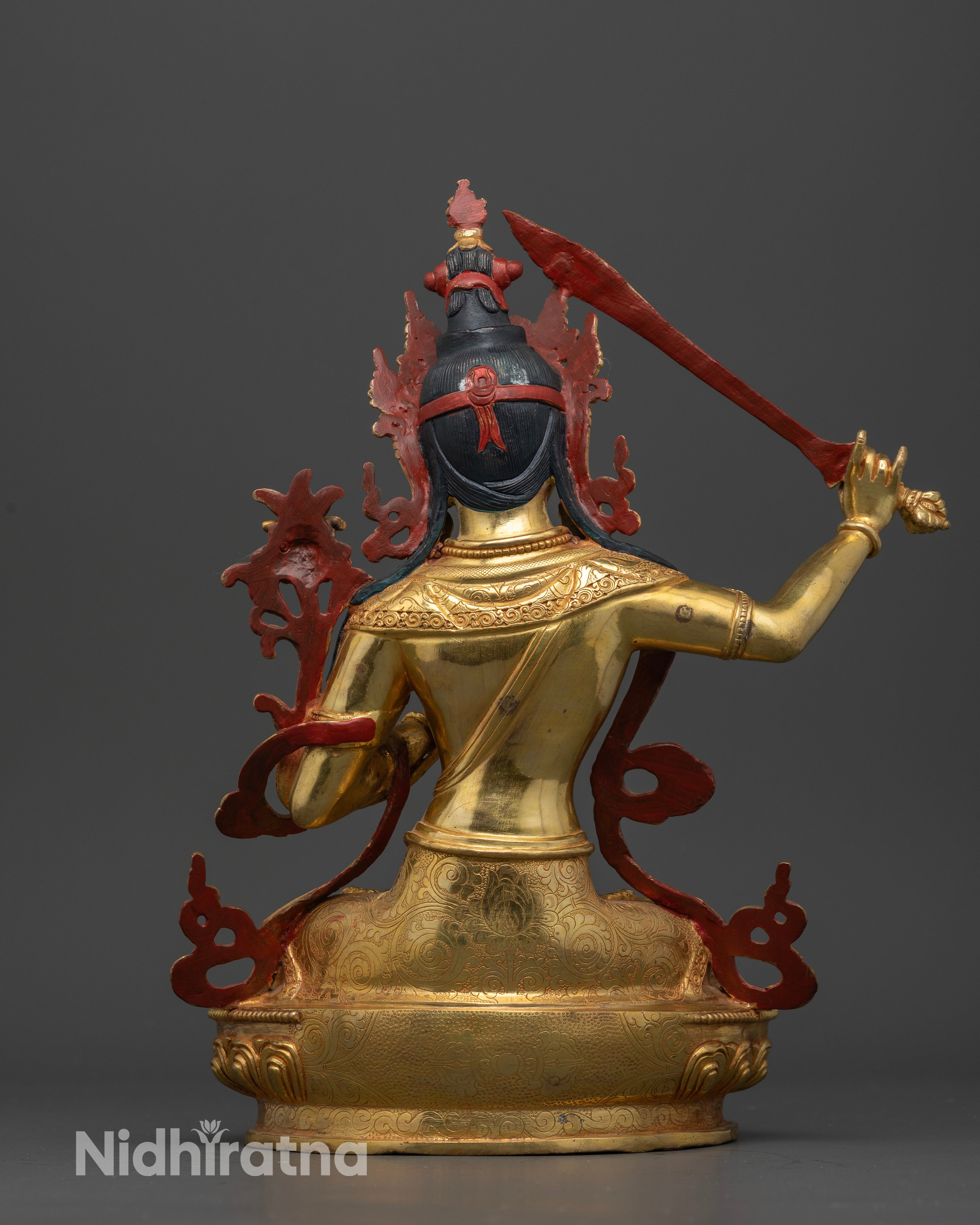 Back view Manjushri statue lotus throne carving Himalayan Buddhist sculpture Nepal