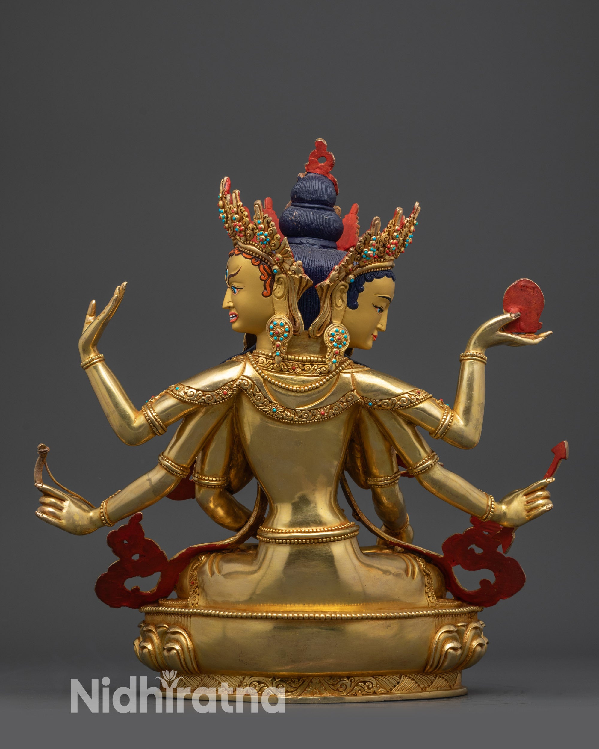 Back view Namgyalma statue showing carved details and radiant gold-gilded finish