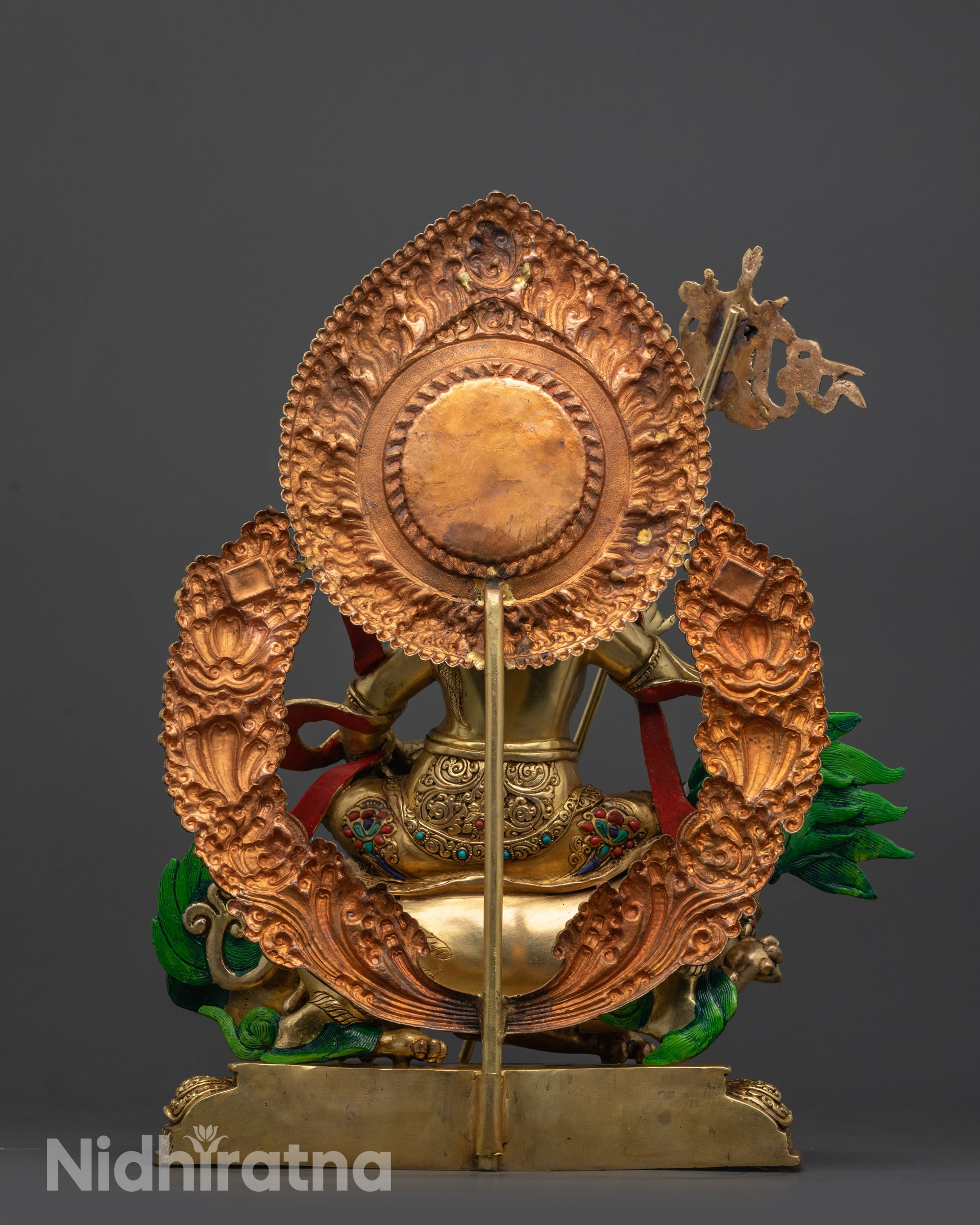 Back view Namtoshe Statue displaying radiant halo and detailed warrior-like pose