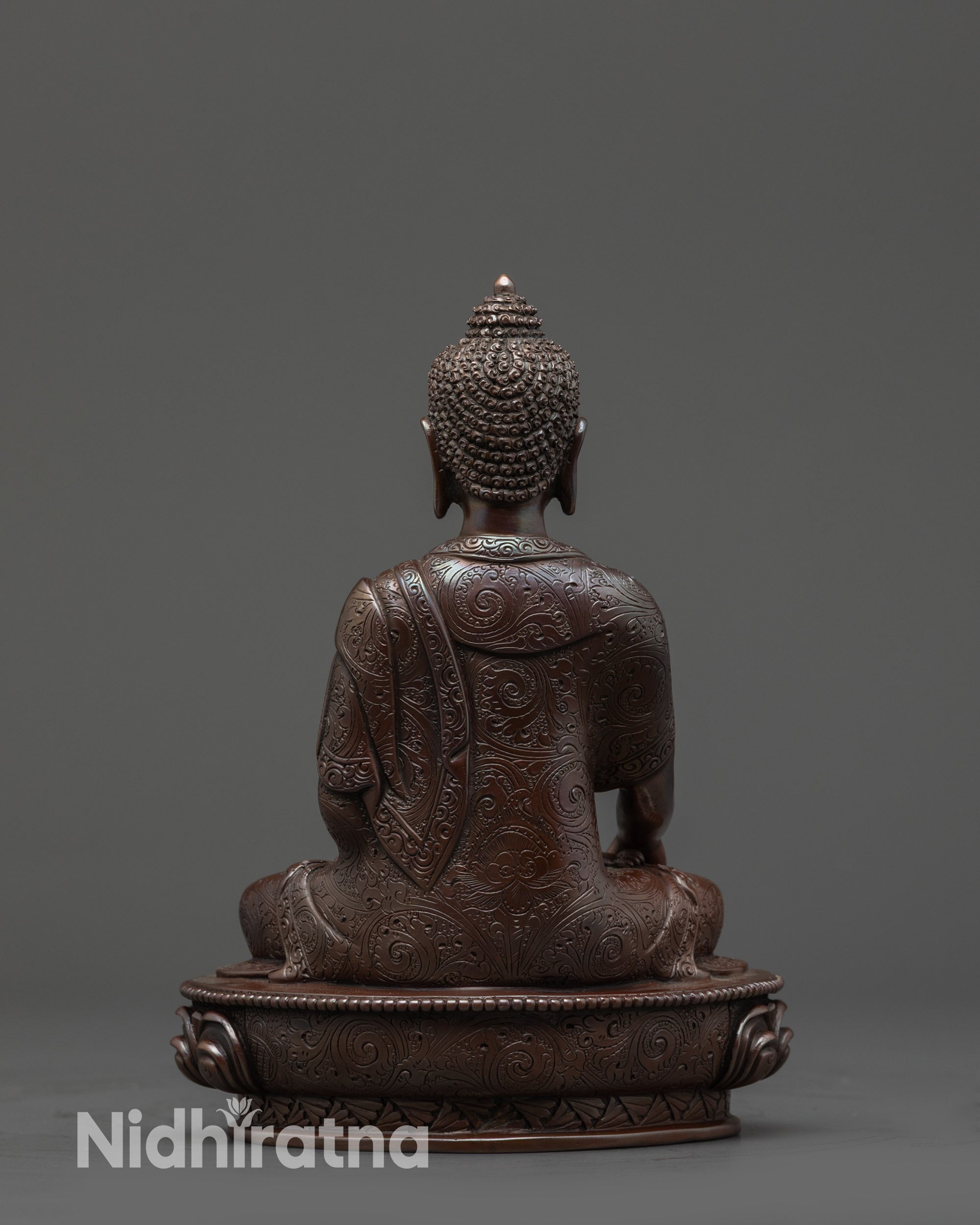 Back view Oxidized Buddha Mitrugpa Statue highlighting detailed lotus base carvings