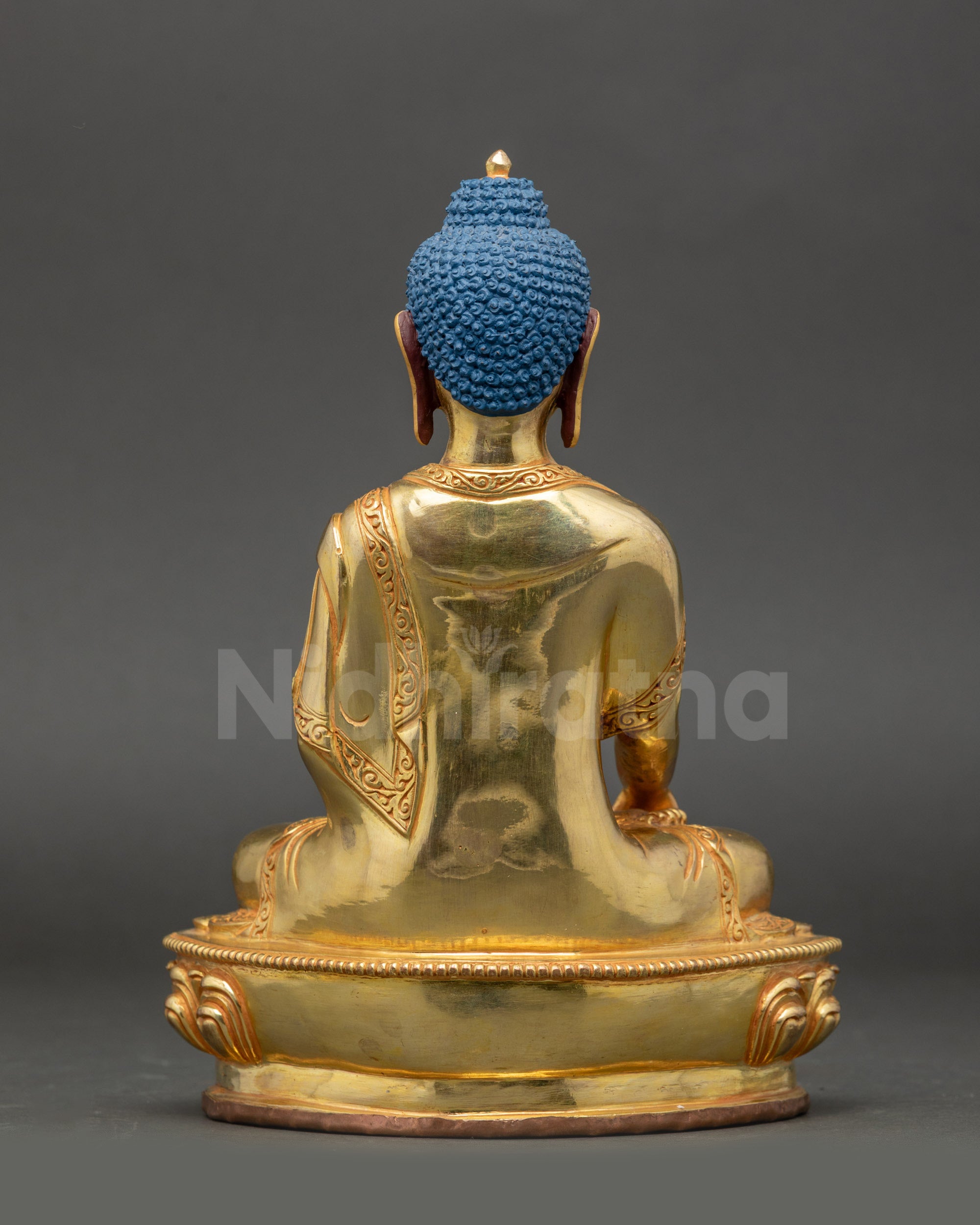 Back view Shakyamuni Buddha – gold fire-gilded copper statue with detailed lotus base