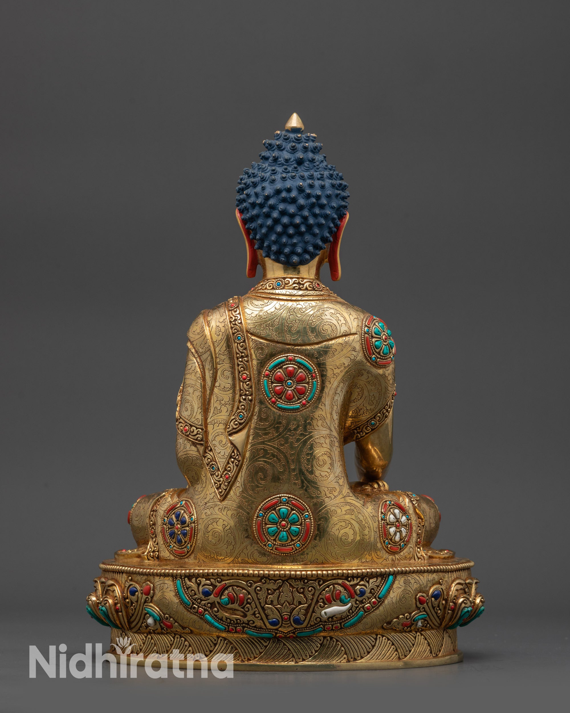 Back view Shakyamuni Buddha robe adorned with patterns and semi-precious stones