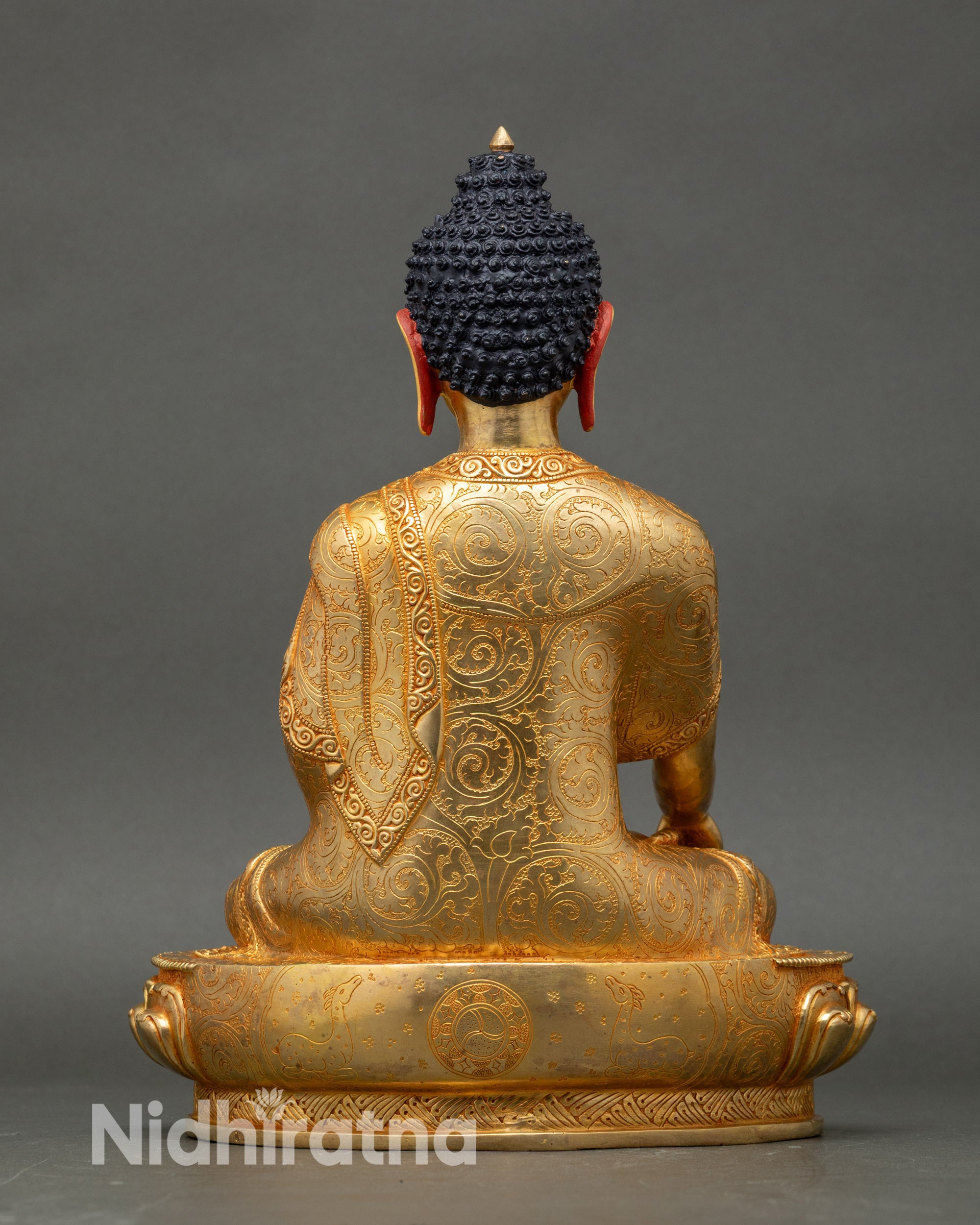 Back view Shakyamuni Buddha statue showing detailed robe folds and Himalayan craftsmanship
