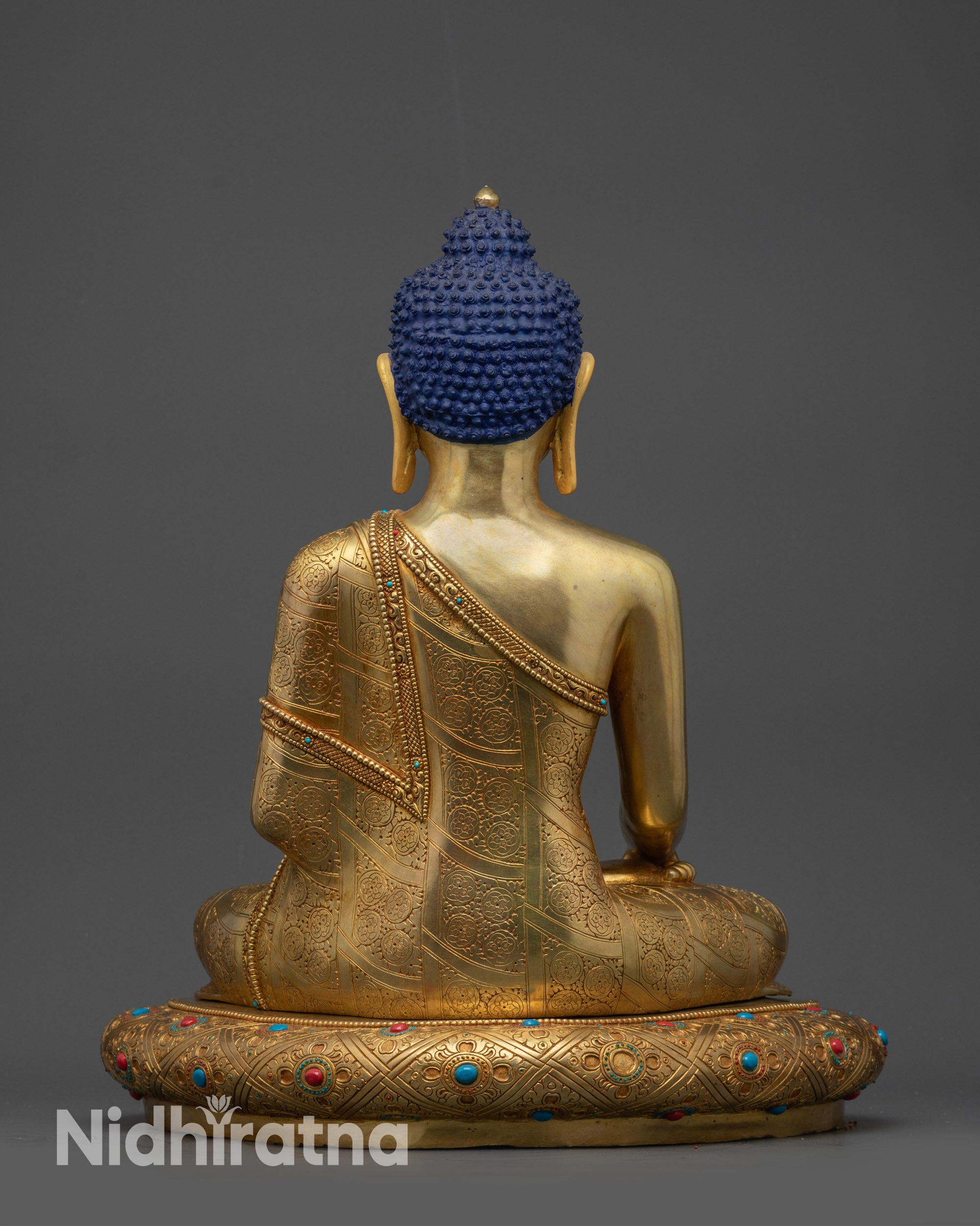 Back view Shakyamuni Buddha statue with intricate detailing and gold fire-gilded base