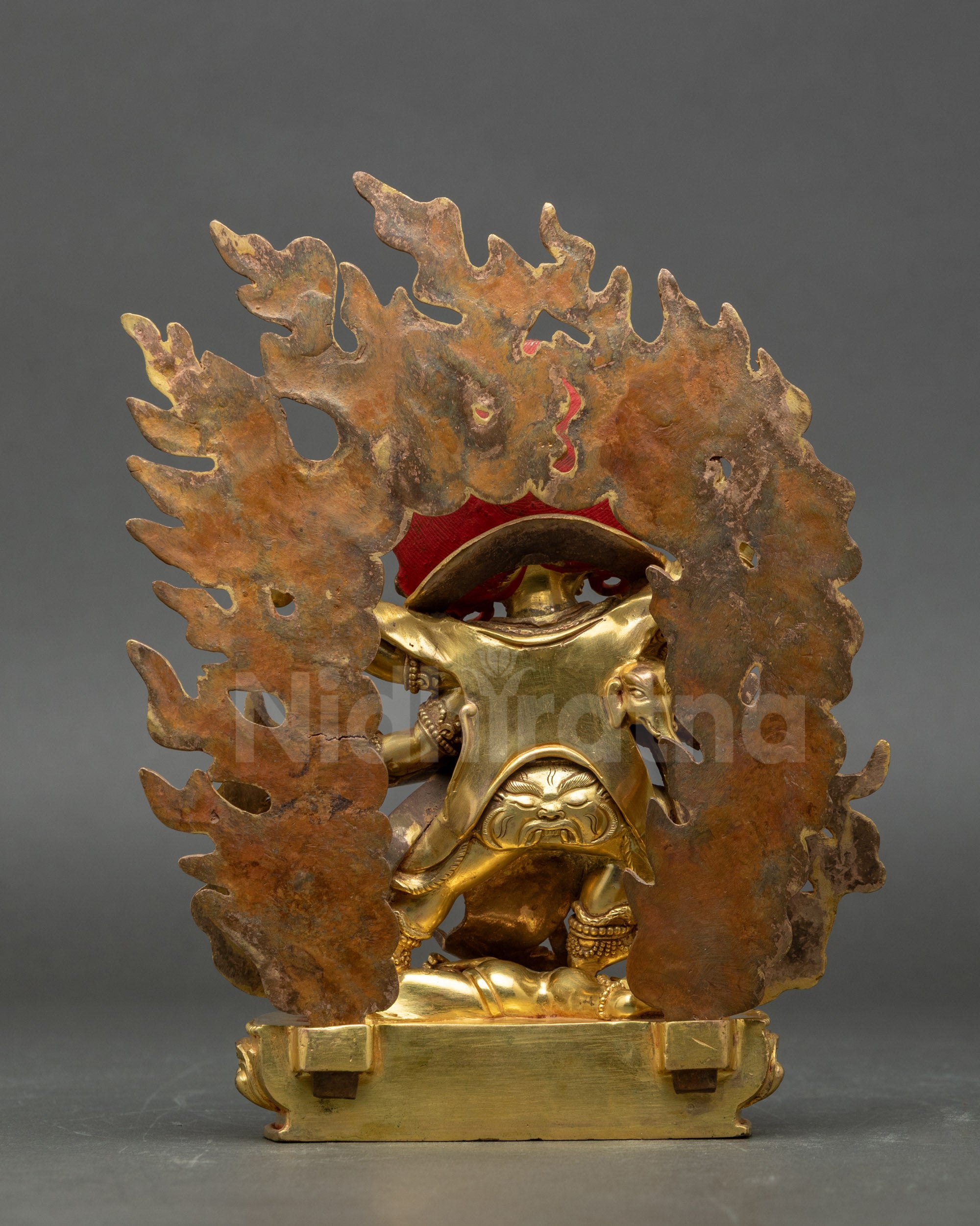 Back view Six-Armed Mahakala on lotus throne with wisdom flame halo, sacred altar art