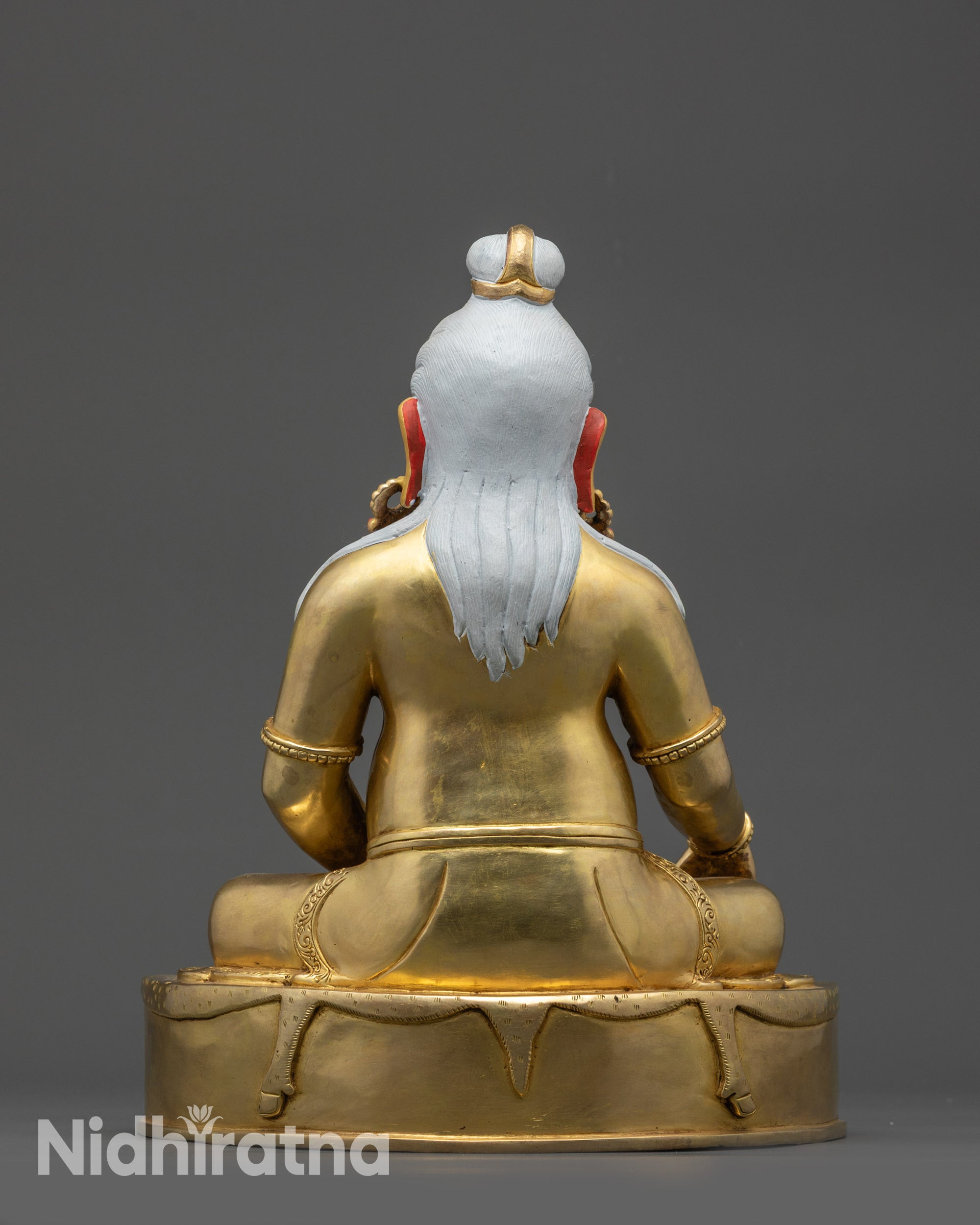 Back view Thangtong Gyalpo seated on striped deer skin with intricate carvings