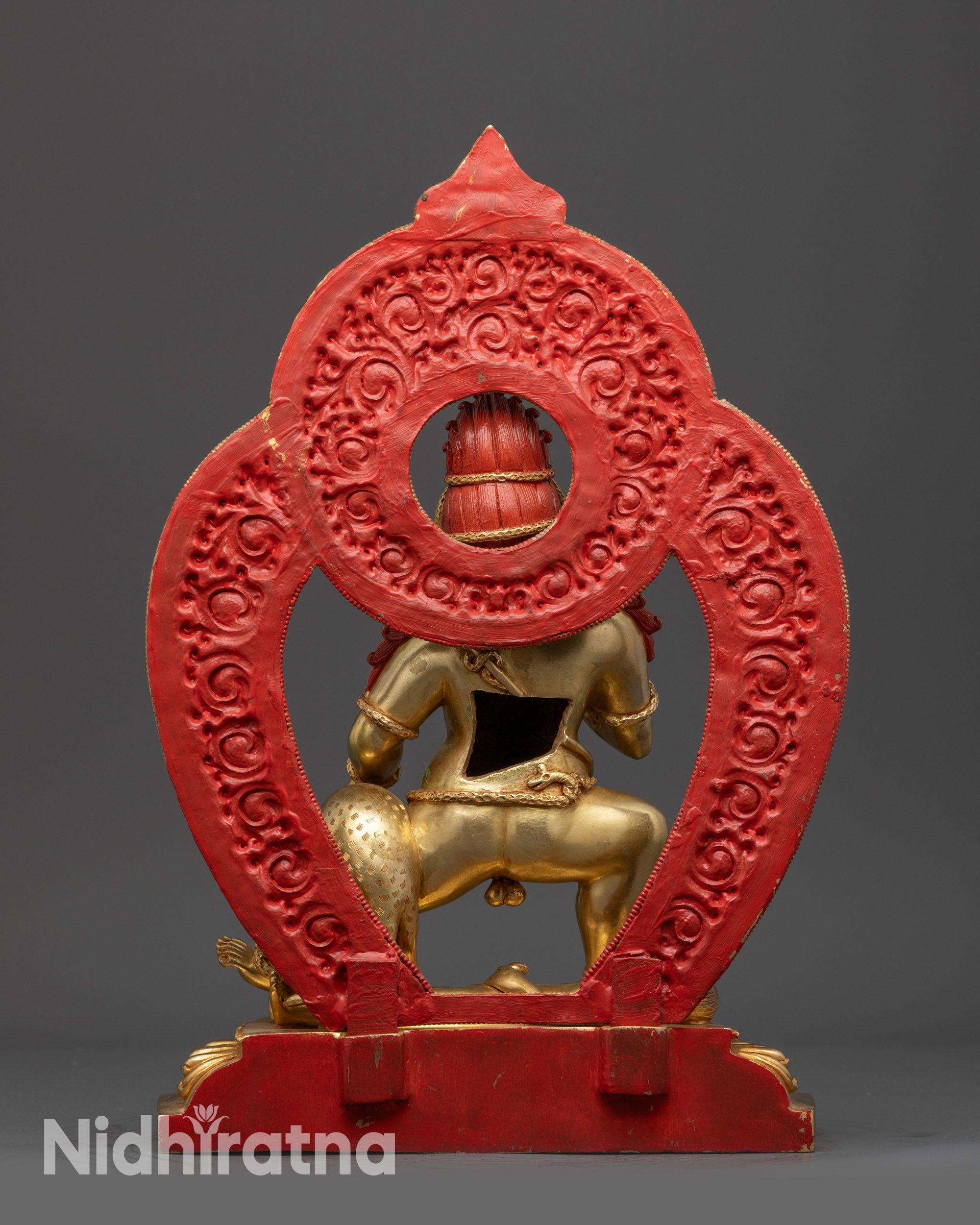 Back view Tibetan Black Dzambhala Buddha with elaborate halo and floral carvings