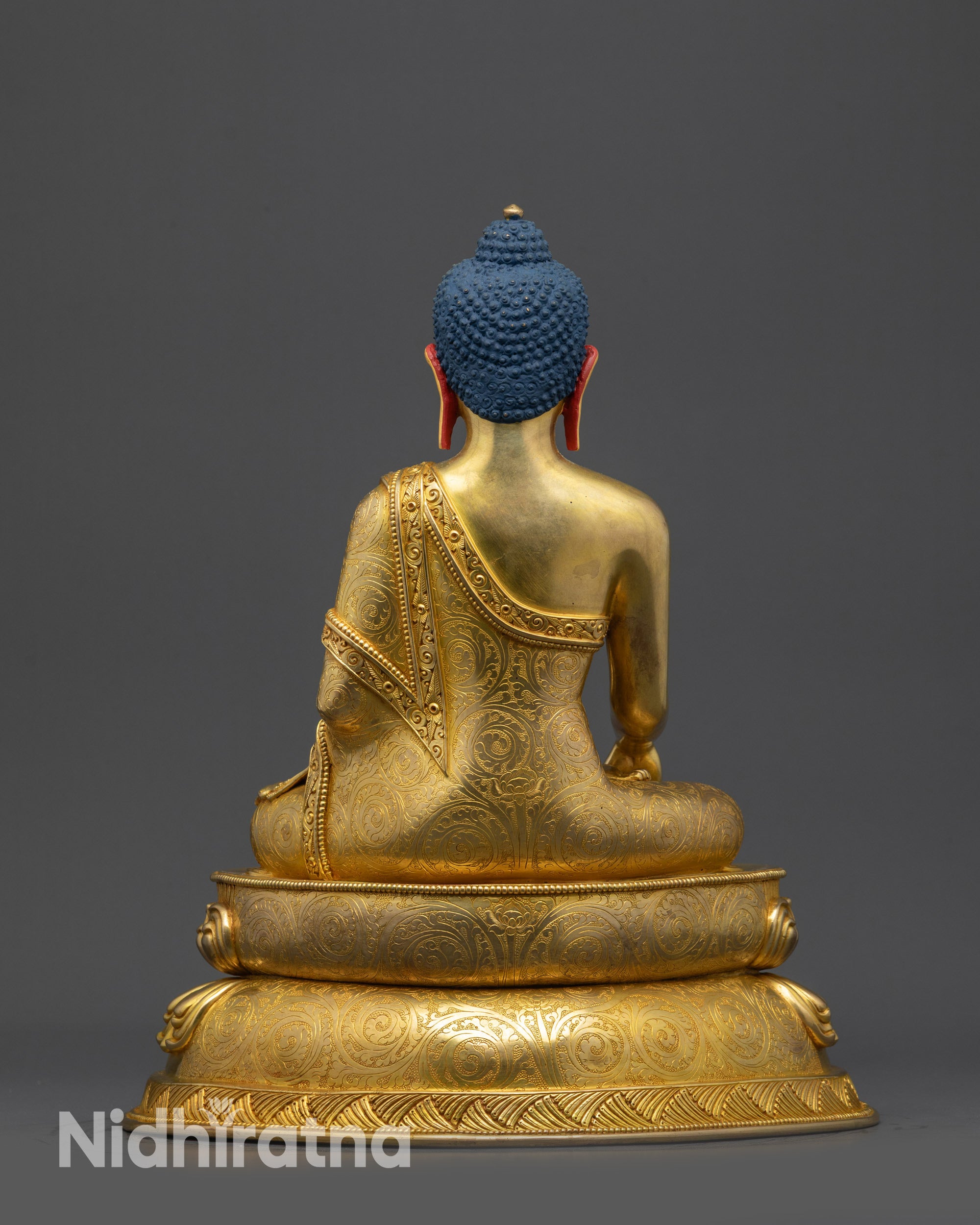 Back view Tibetan Buddha Statue showing detailed robe patterns and craftsmanship