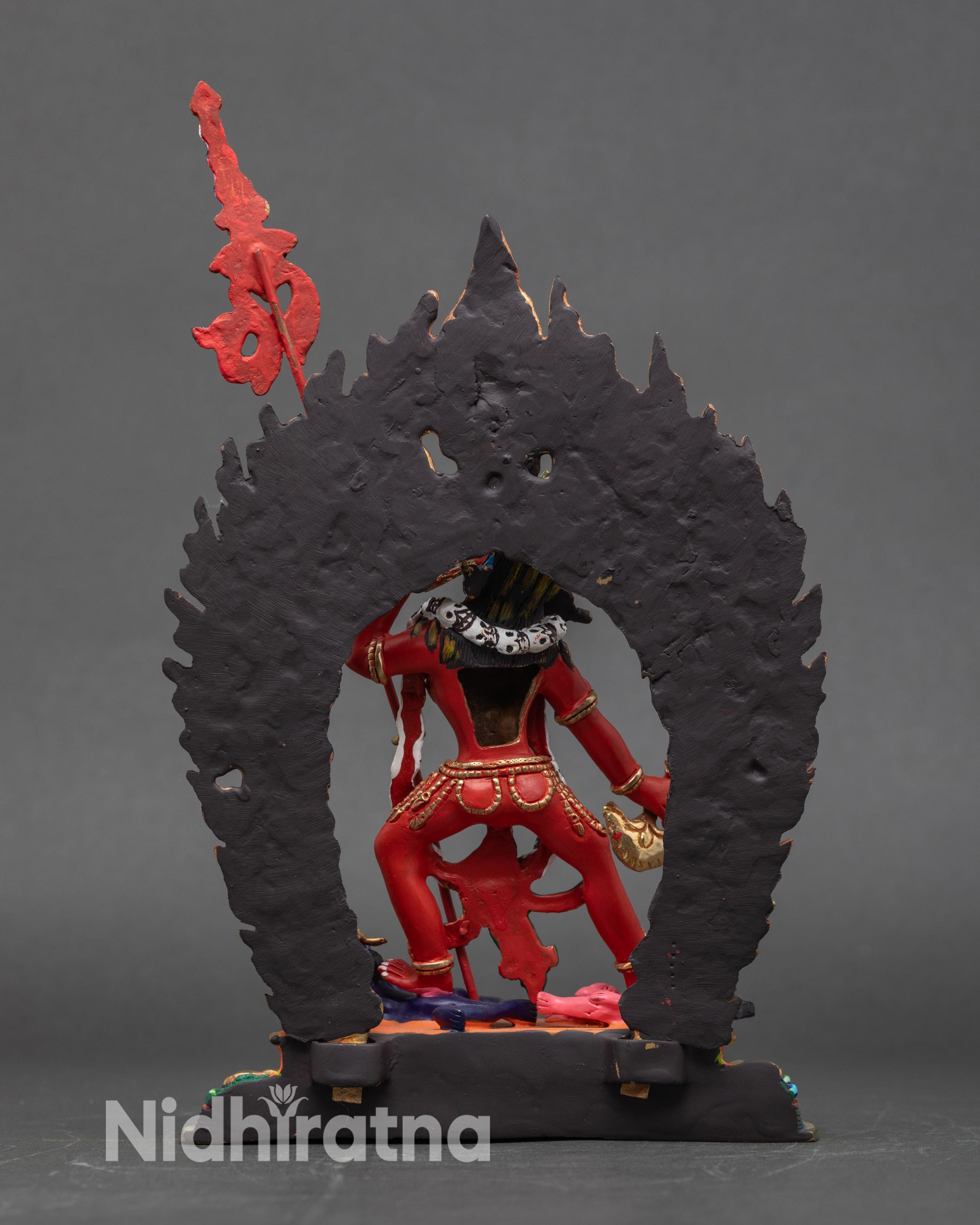 Back view Vajrayogini statue blazing fire halo flames and skulls handmade Nepal