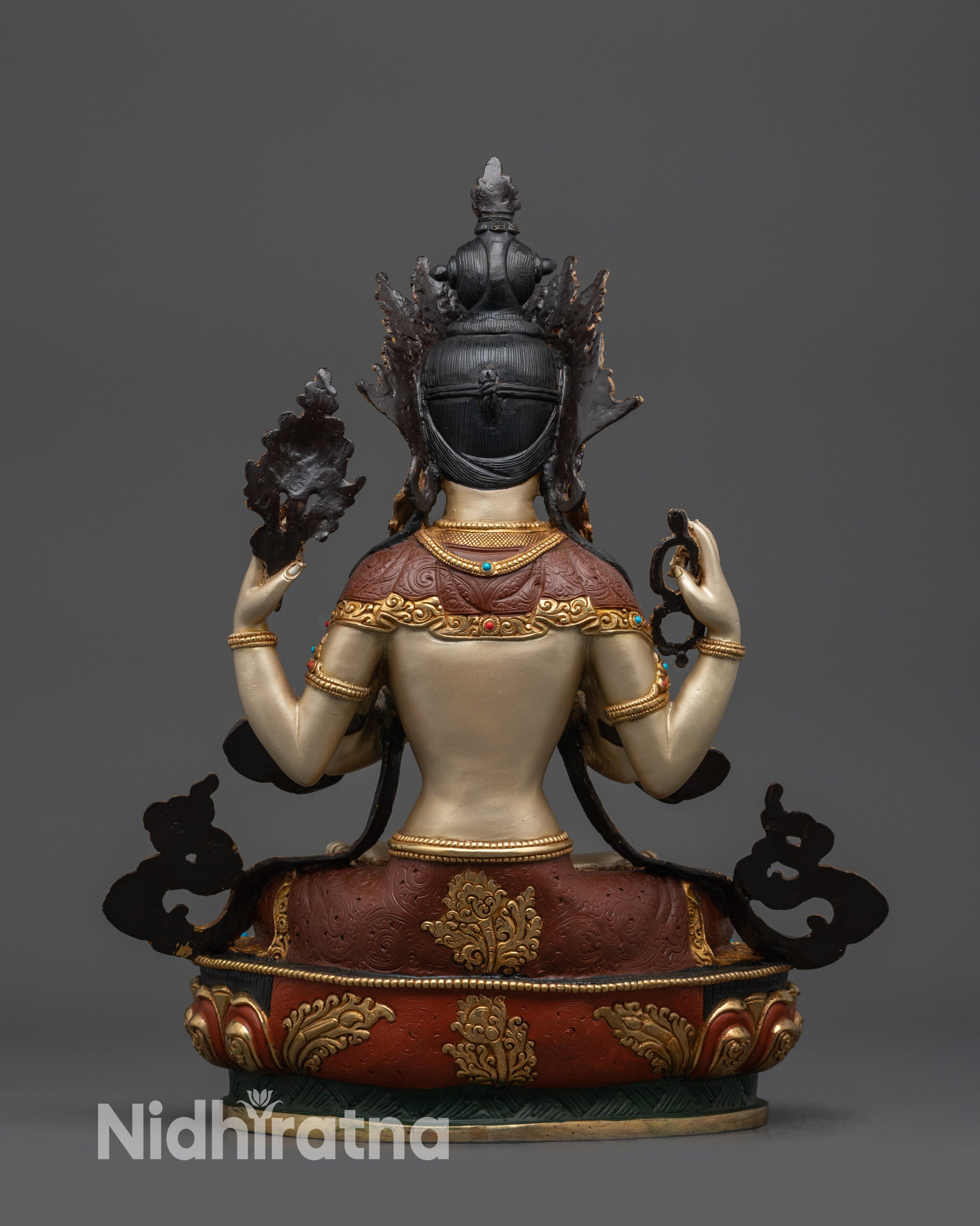 Back view White-Hued Chenrezig statue showing gold-plated robe and intricate patterns