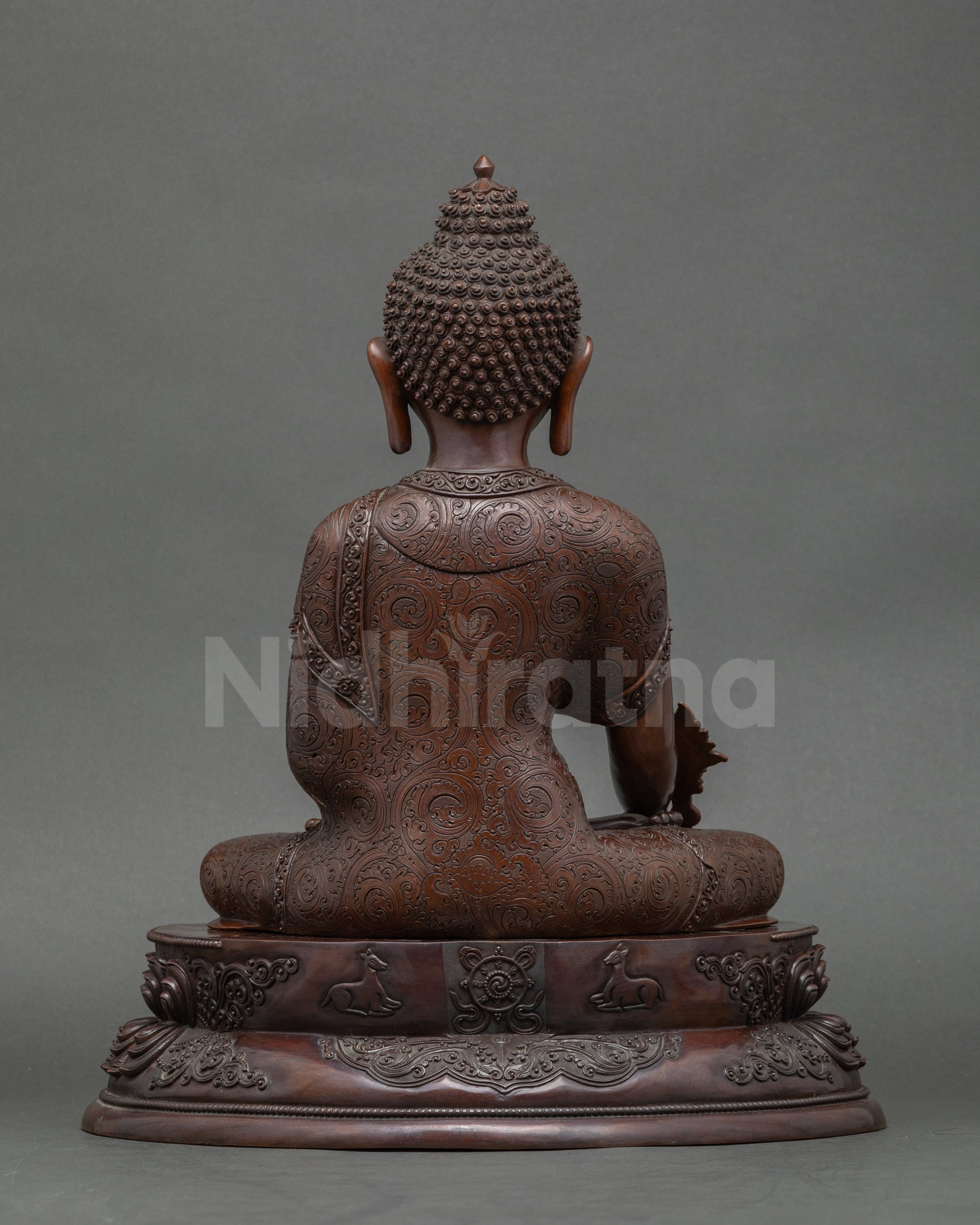 Back view copper Medicine Buddha statue with oxidized details, double lotus throne focus