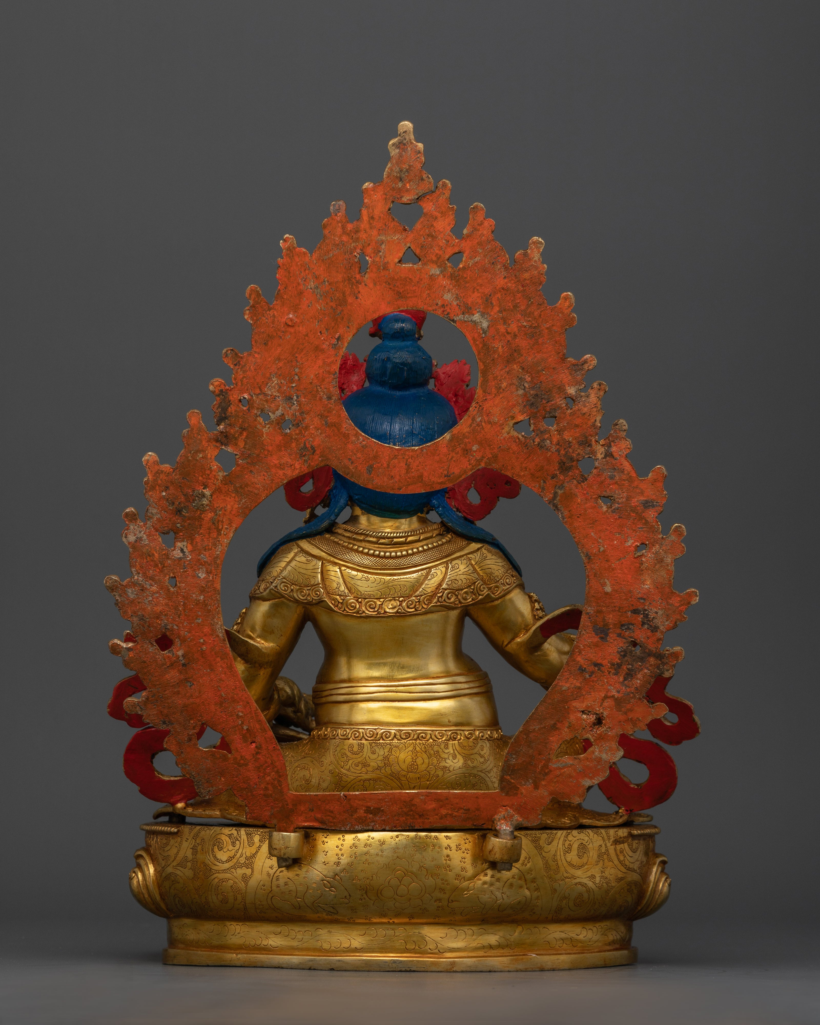 Back view gold-gilded Nepalese Dzambhala statue handcrafted lost-wax copper