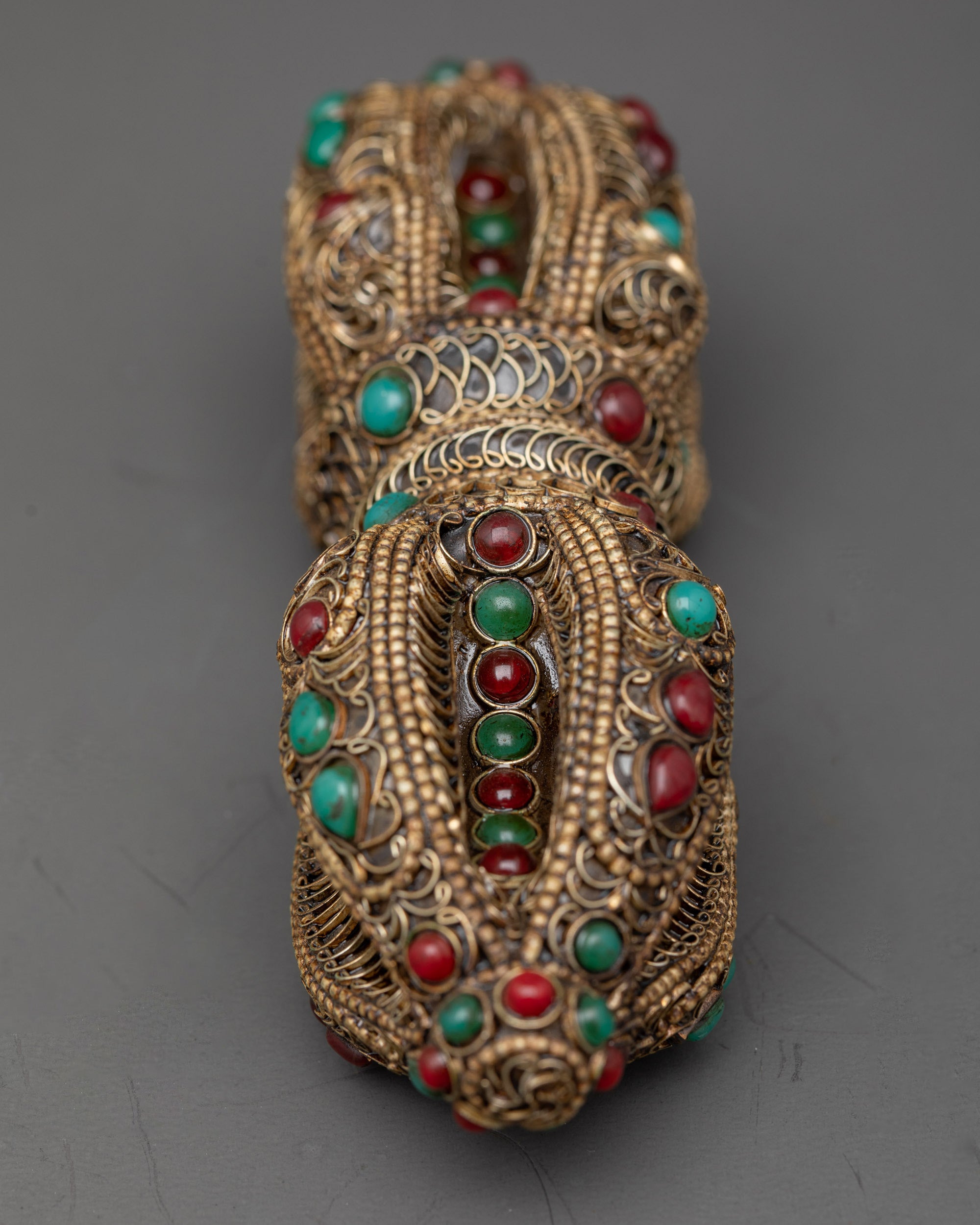 Back view handcrafted copper Vajra with ornate lotus-like ends