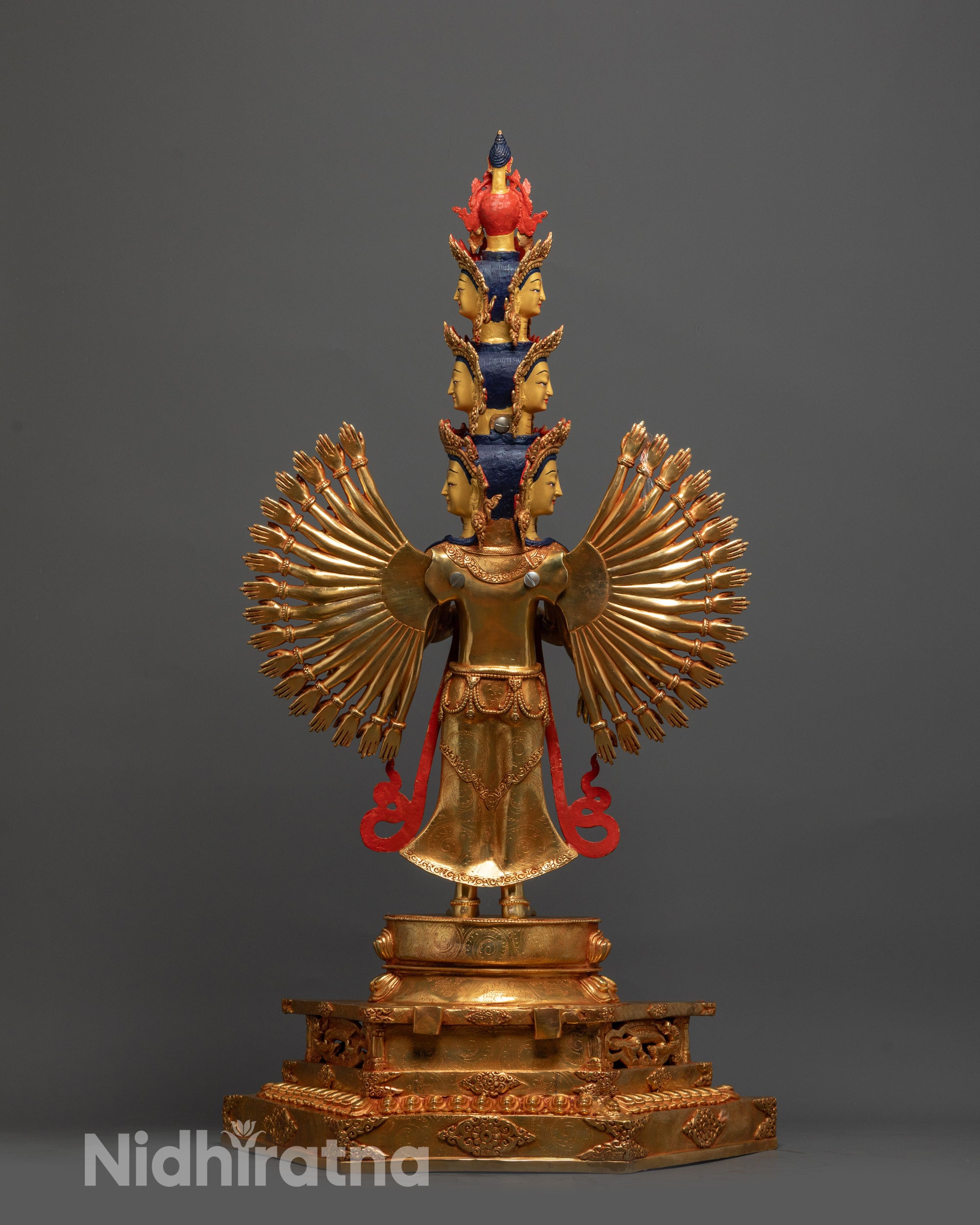 Back view of 1000-Armed Guan Yin Statue highlighting carved patterns and fire-gilded body