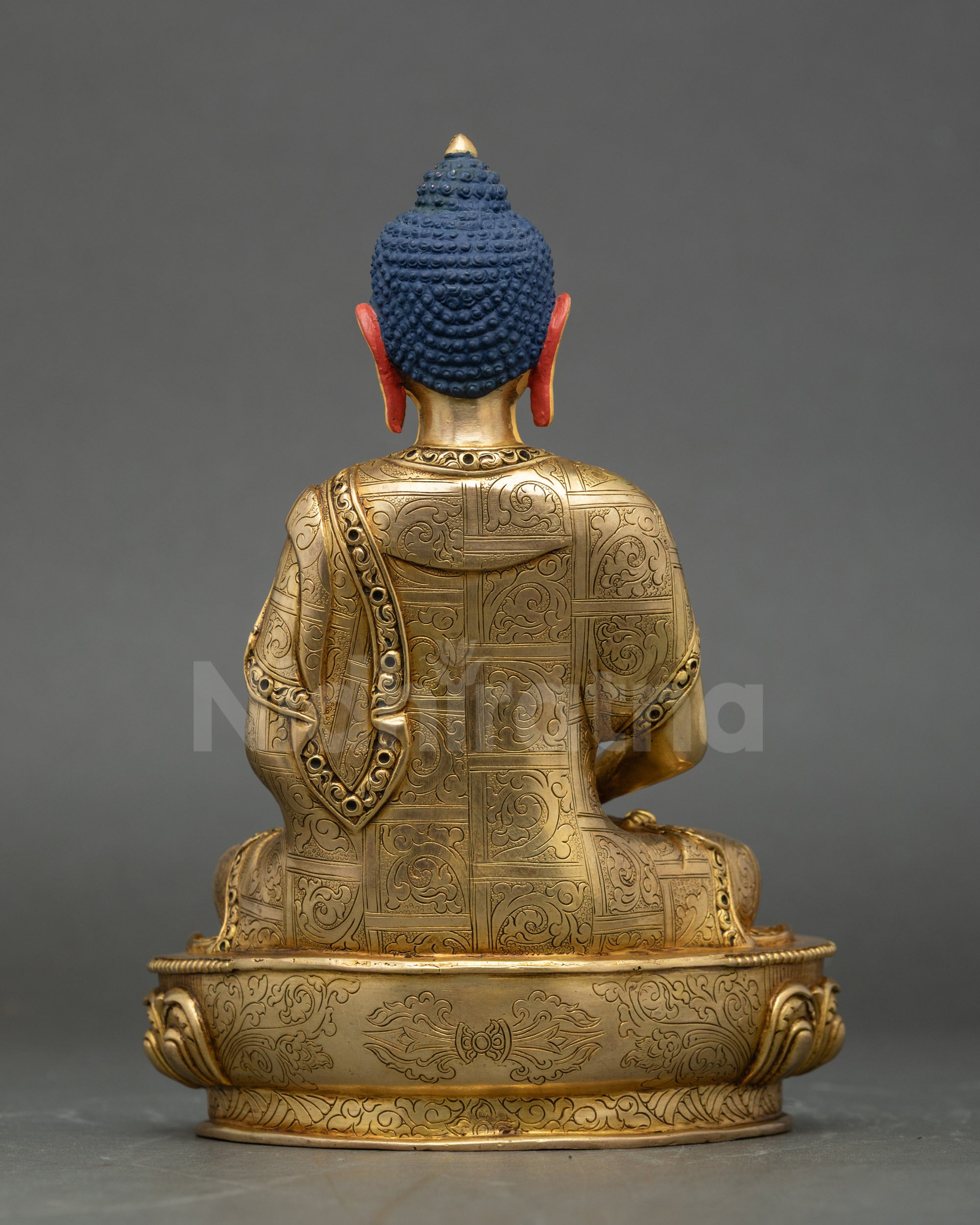 Back view of Amitabha Buddha Statue showing intricate carvings and lotus base