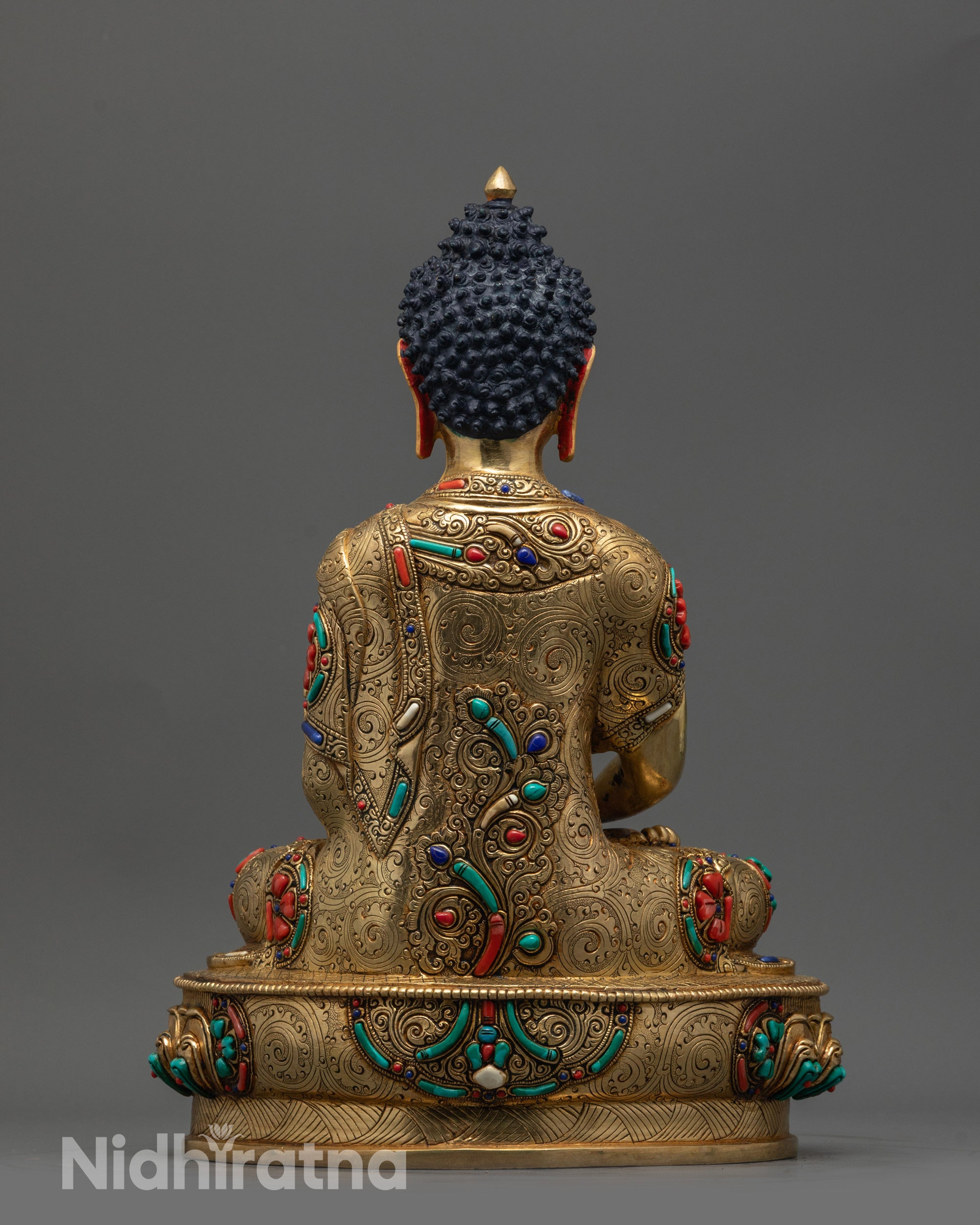 Back view of Amitabha Buddha statue displaying detailed craftsmanship and smooth surface