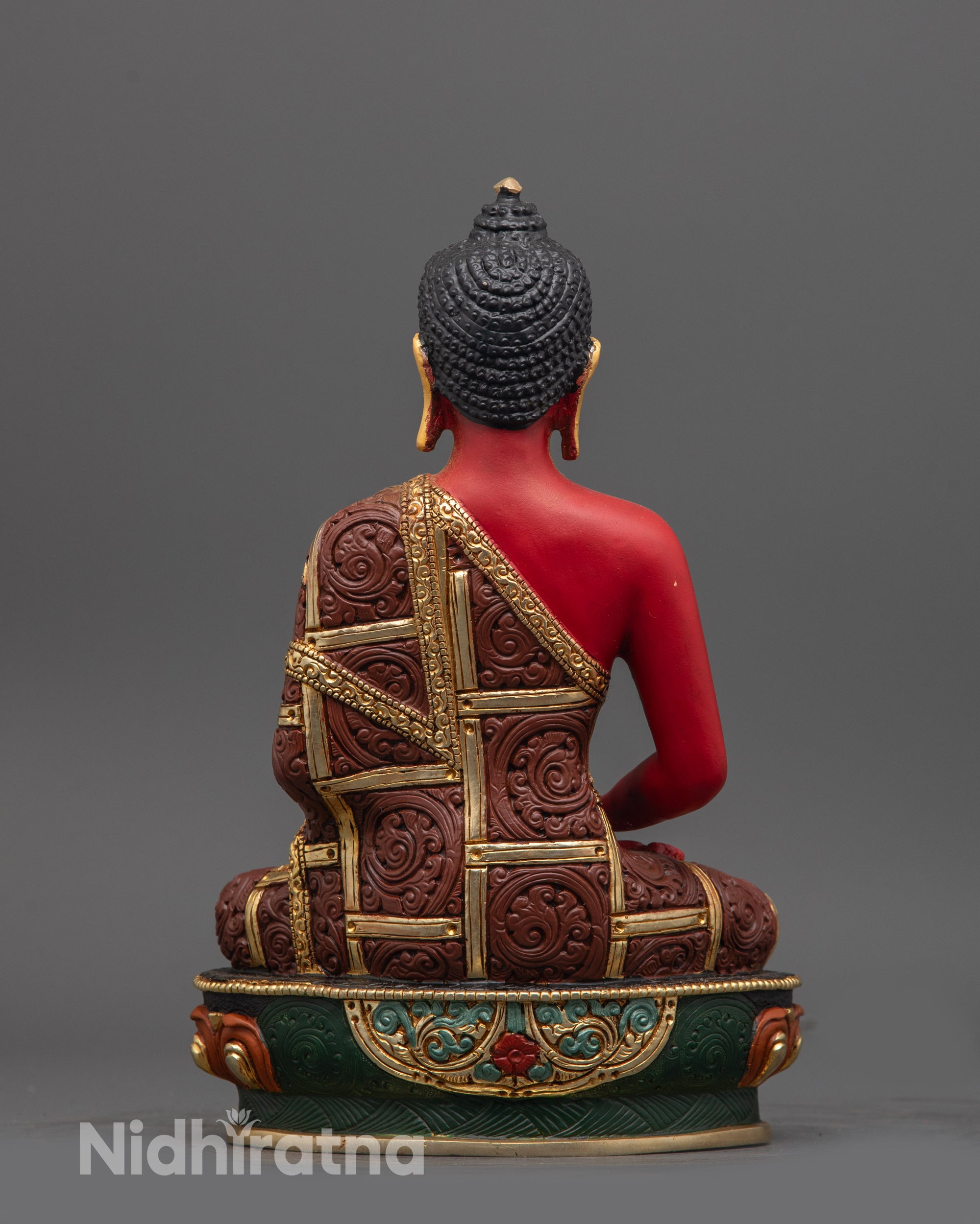 Back view of Amitabha Buddha statue highlighting multi-coloured lotus seat and intricate carving