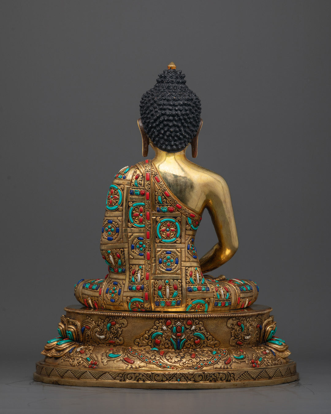 Back view of Amitabha Tathagata sculpture highlighting craftsmanship and stone adornments
