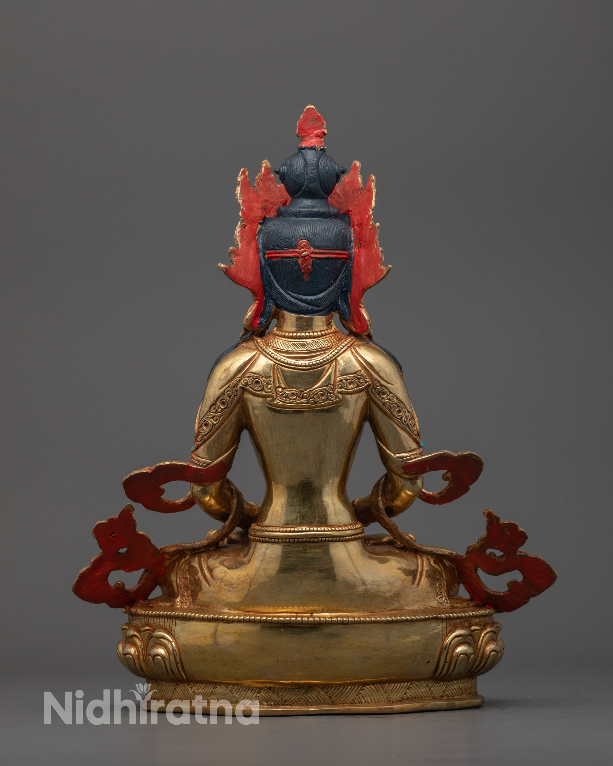 Back view of Amitayus Buddha Statue featuring a hollow consecration chamber