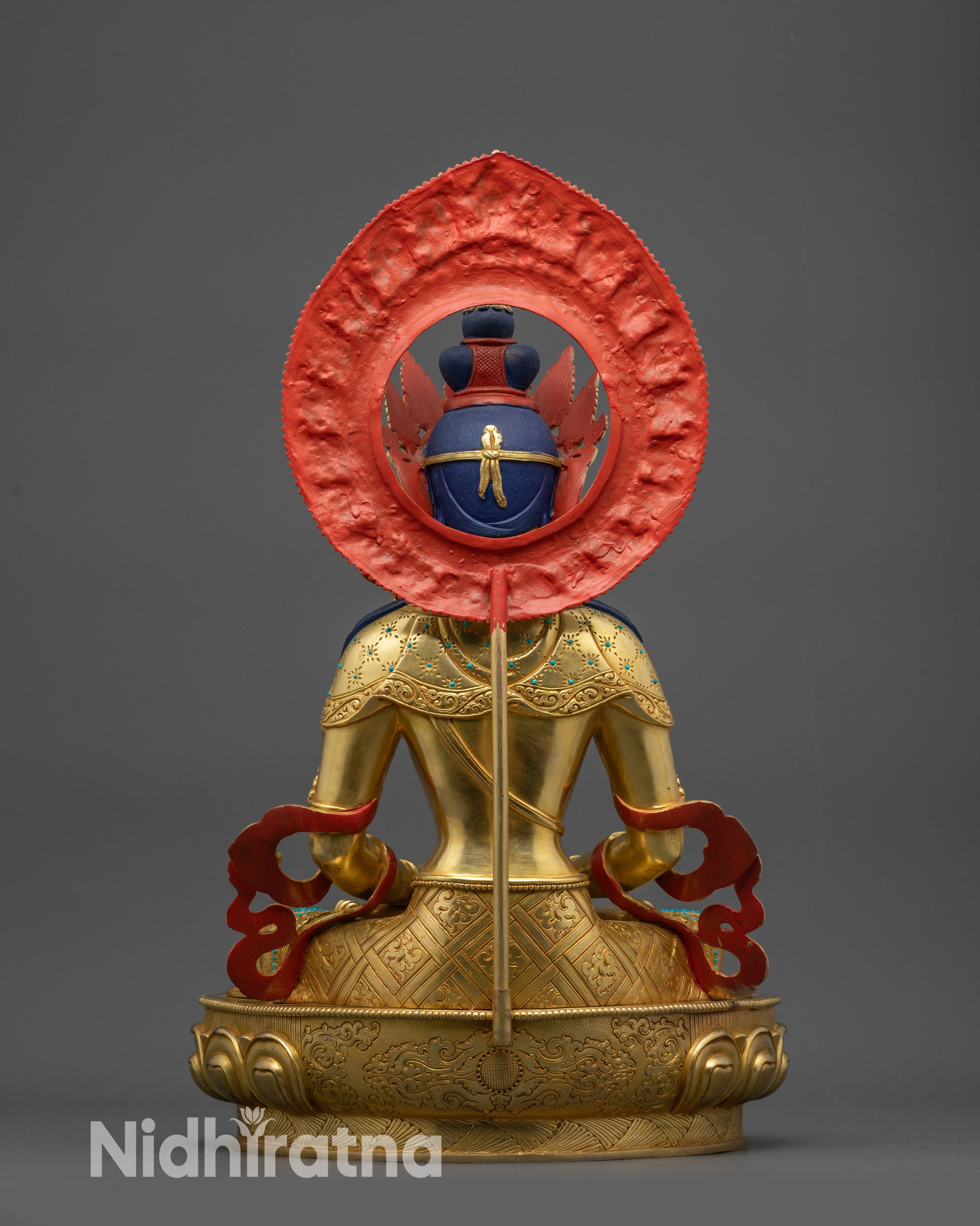 Back view of Amitayus Buddha showing floral halo and intricate artisan detailing