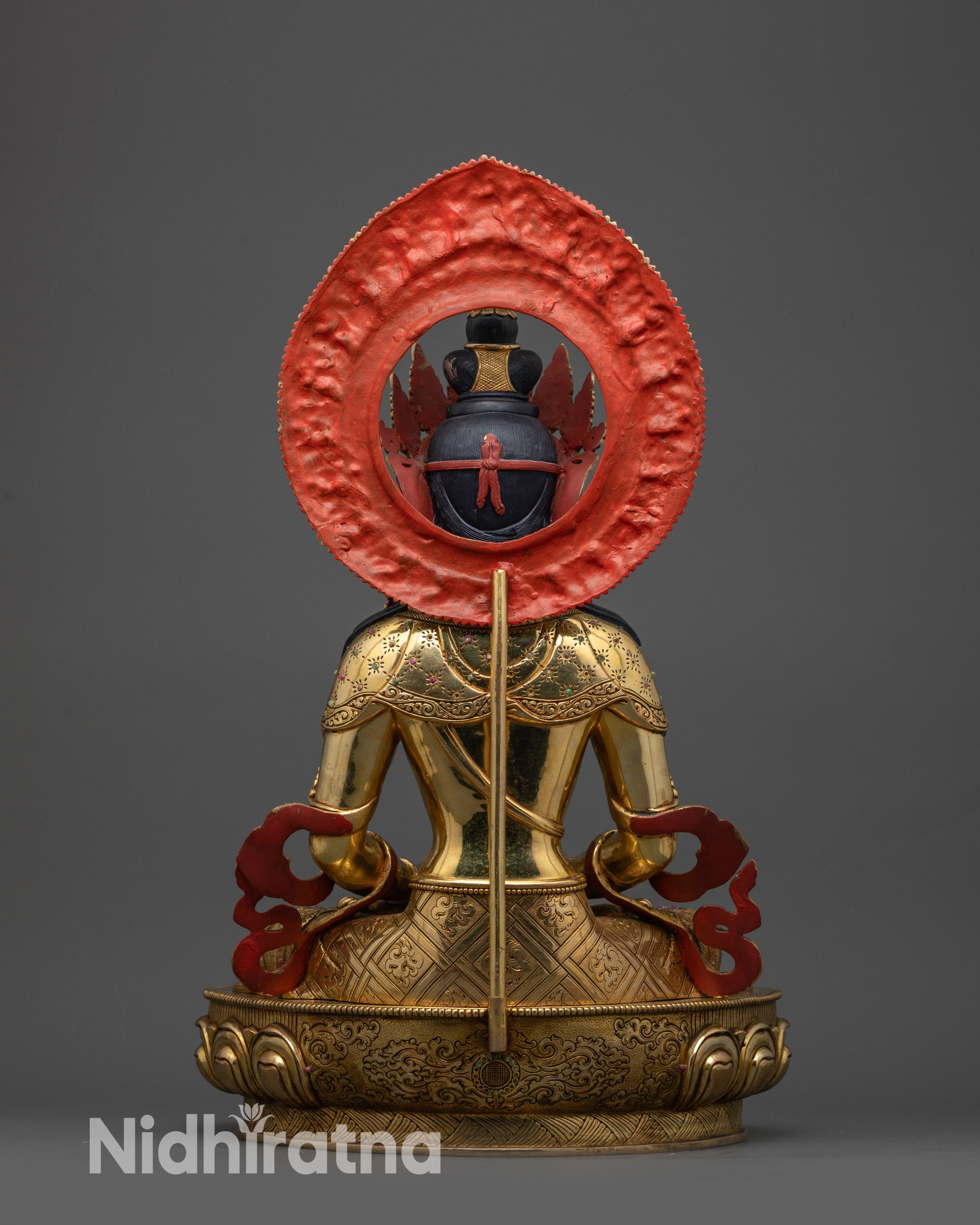 Back view of Amitayus Statue showing intricate floral designs and lotus pedestal