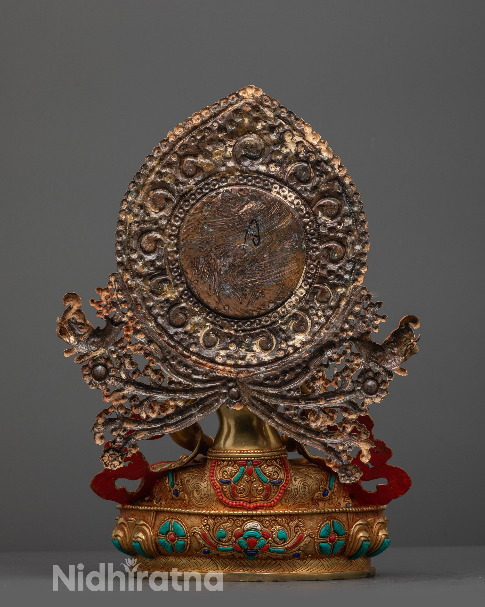 Back view of Amitayus Statue showing intricate robes and halo craftsmanship