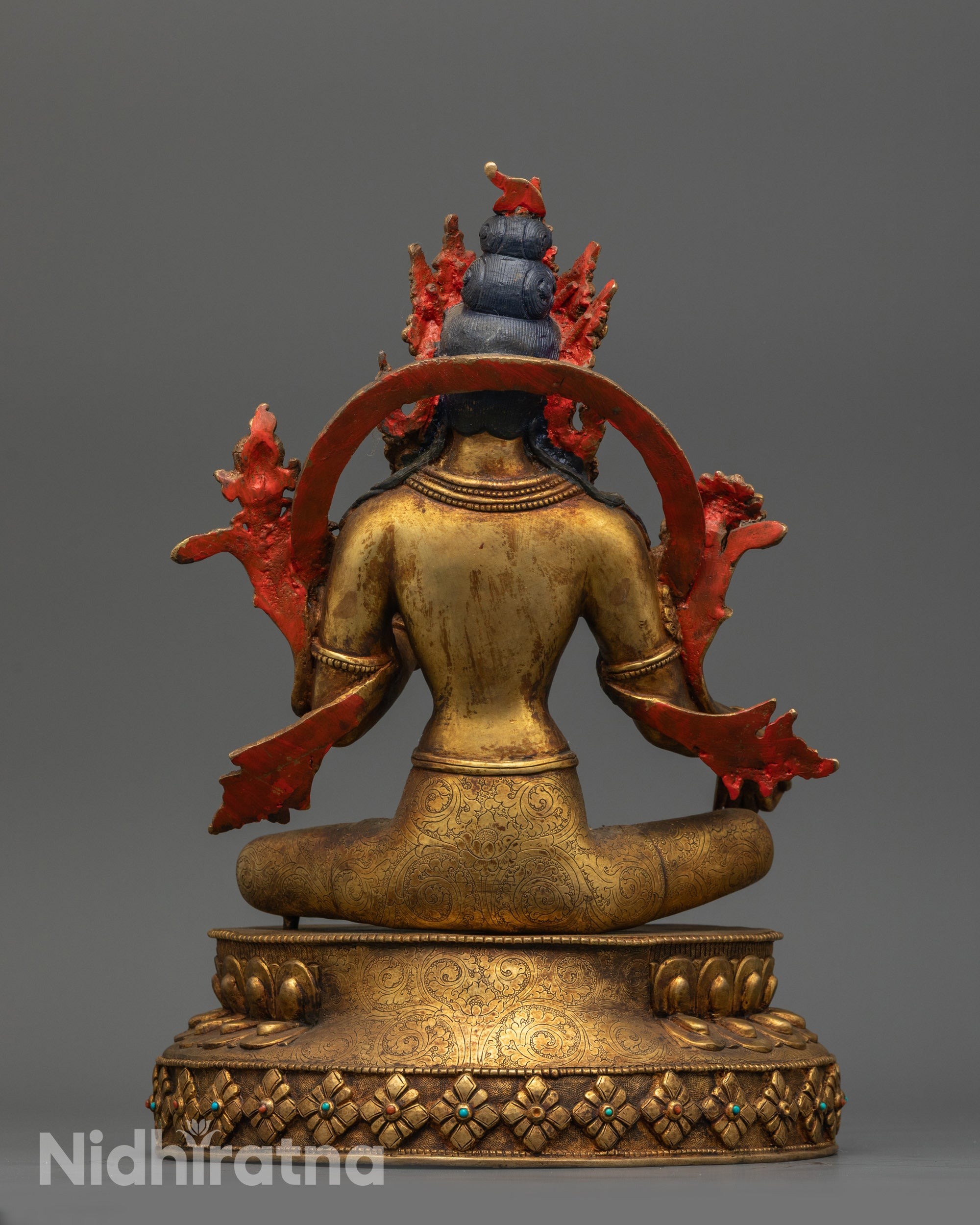 Back view of Antique Finish Green Tara Statue highlighting carved patterns and flowing robes