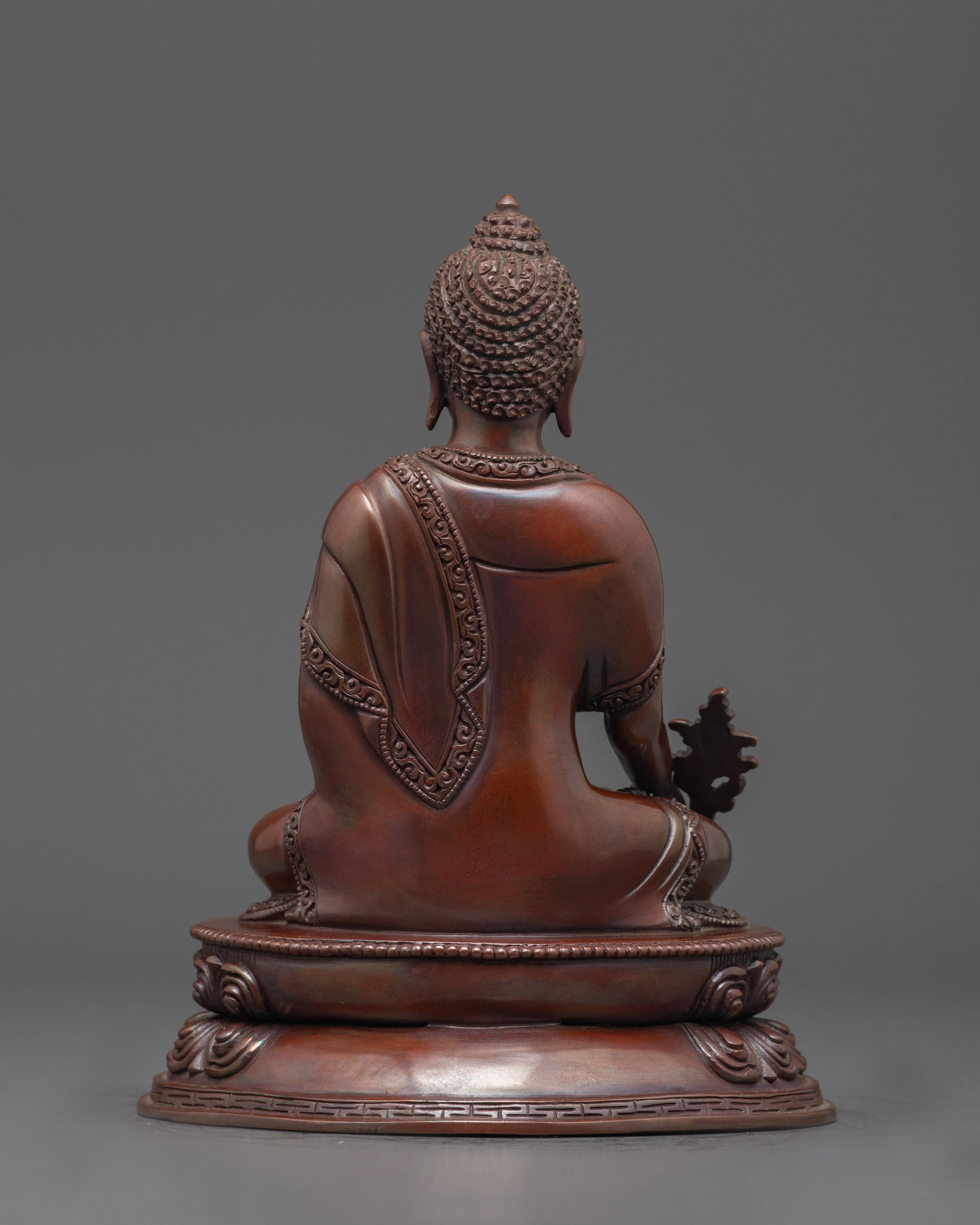 Back view of Bhaisajyaguru Oxidized Tibetan Healing Buddha with fine carvings