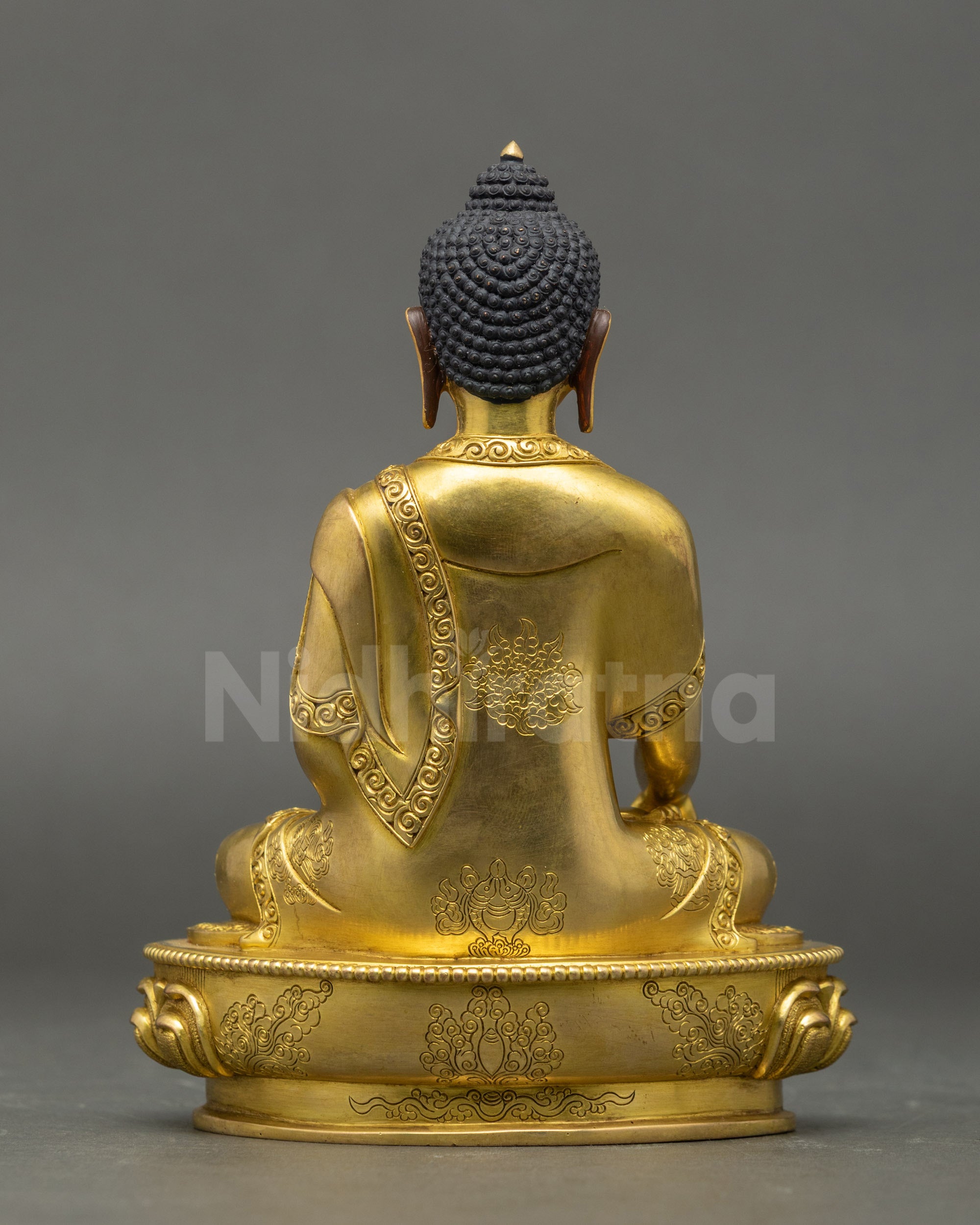 Back view of Buddha Shakyamuni Statue showing flowing robes and Nepalese artisan craftsmanship