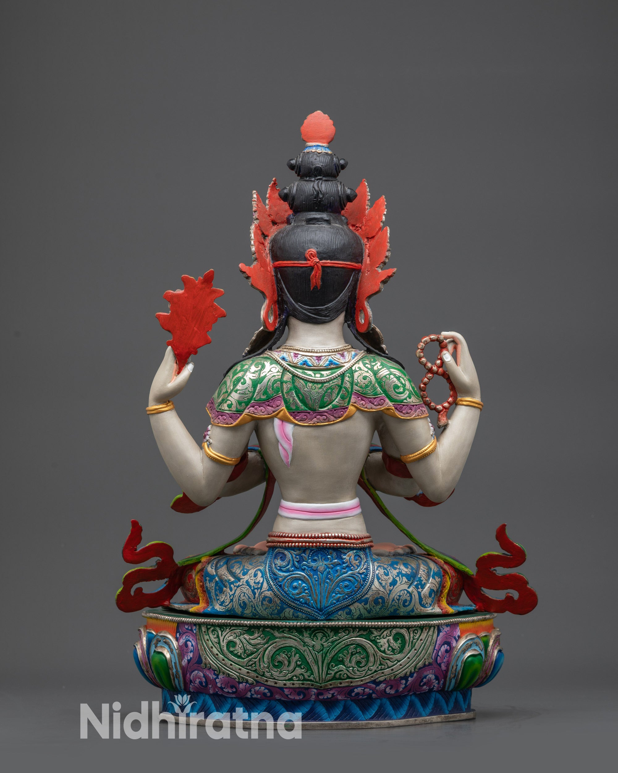 Back view of Chenrezig Statue showing carved lotus throne and flowing robes