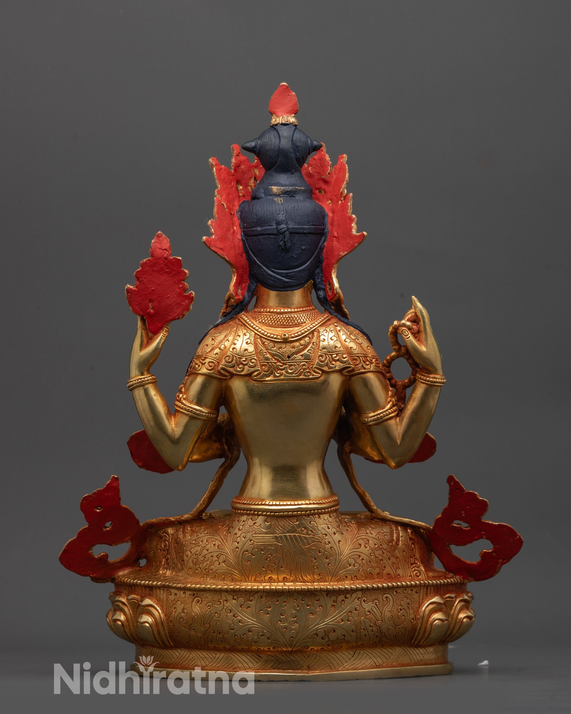 Back view of Chenrezig Statue showing lotus throne and detailed artisan copper work