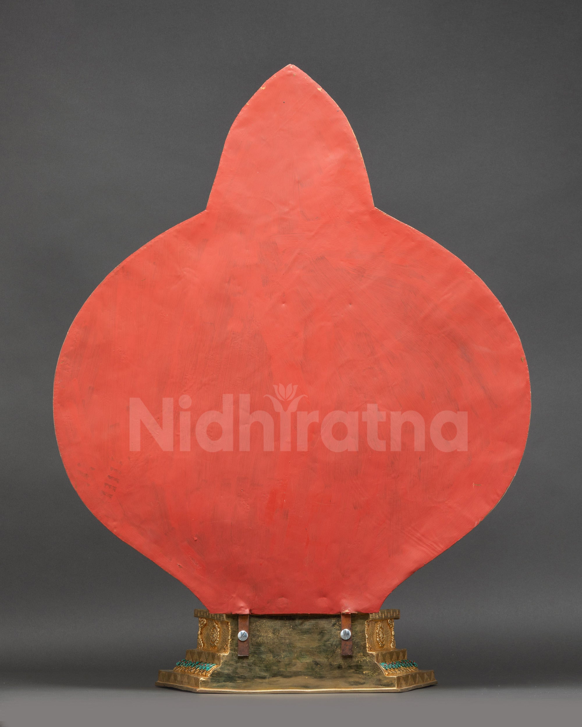 Back view of Chenrezig statue highlighting detailed halo motifs and finely carved patterns