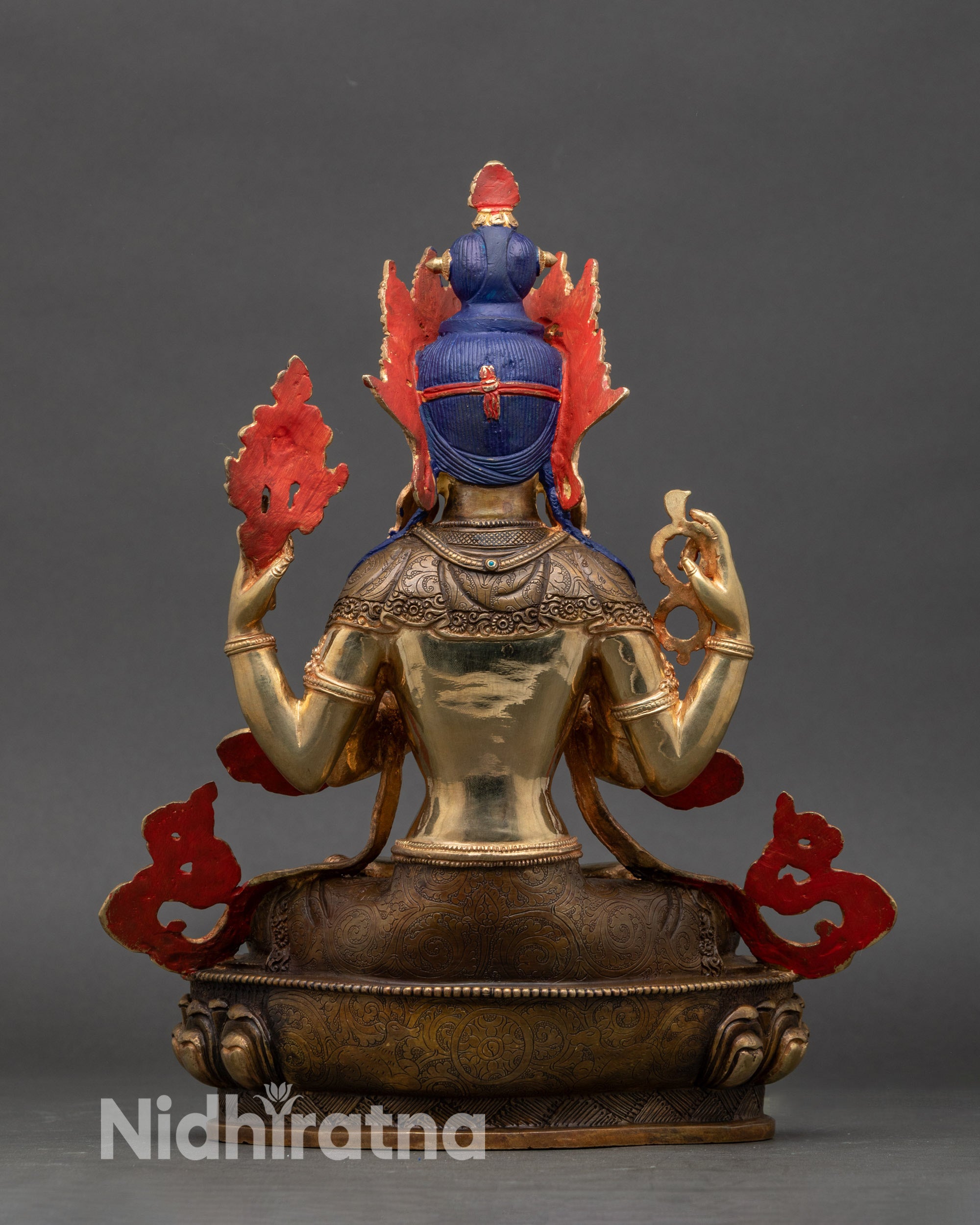 Back view of Chenrezig statue highlighting lotus pedestal and intricate artisan engraving